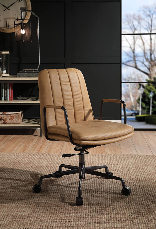Tan tufted faux leather office chair with black metal frame and wooden armrests