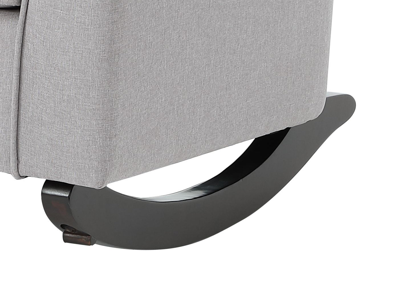 Closeup of a light gray upholstered rocking chair base with dark wood runners