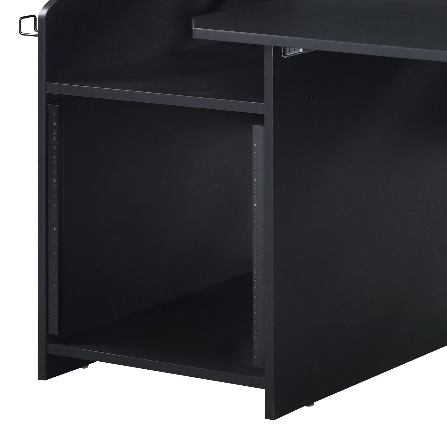 Closeup of black studio desk shelves with rackmount slots