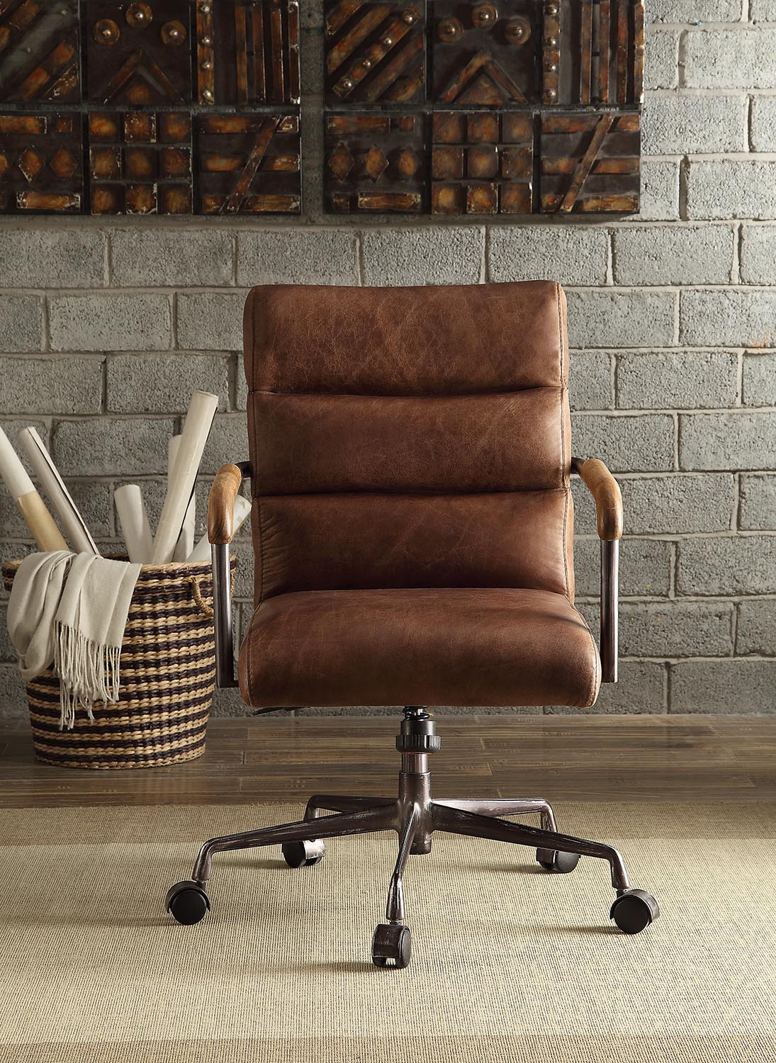 Brown leather executive chair with padded seat and backrest perfect for an office