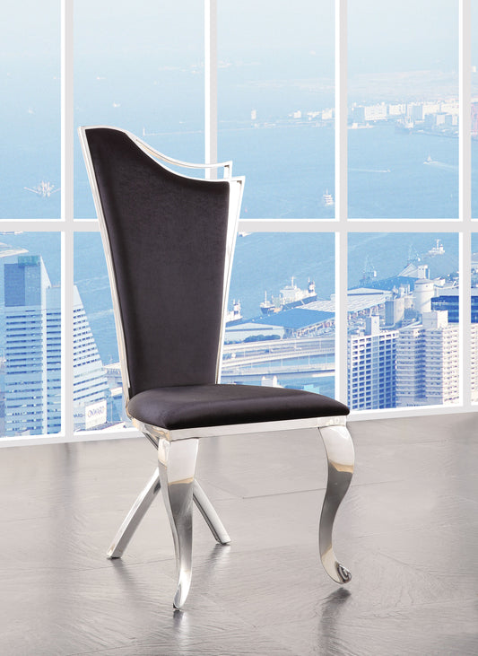 Black velvet dining chair with polished chrome legs and elegant curved back