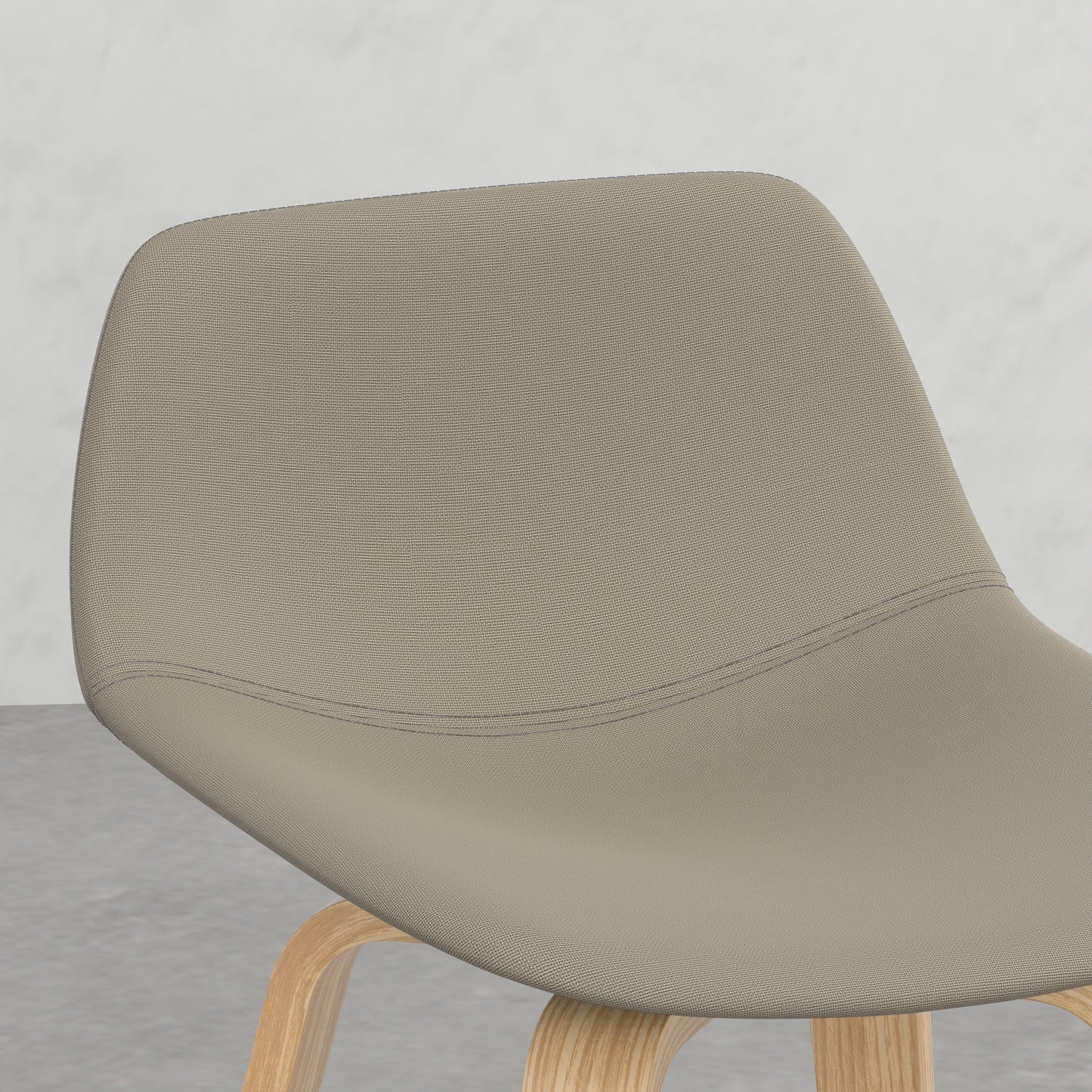 Upholstered dining chair with curved back and light wood legs