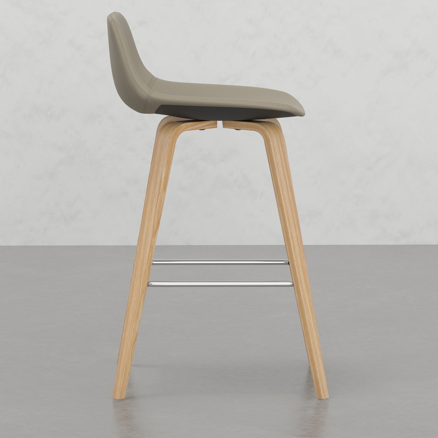 Tan fabric modern bar stool with curved wooden legs and chrome footrest