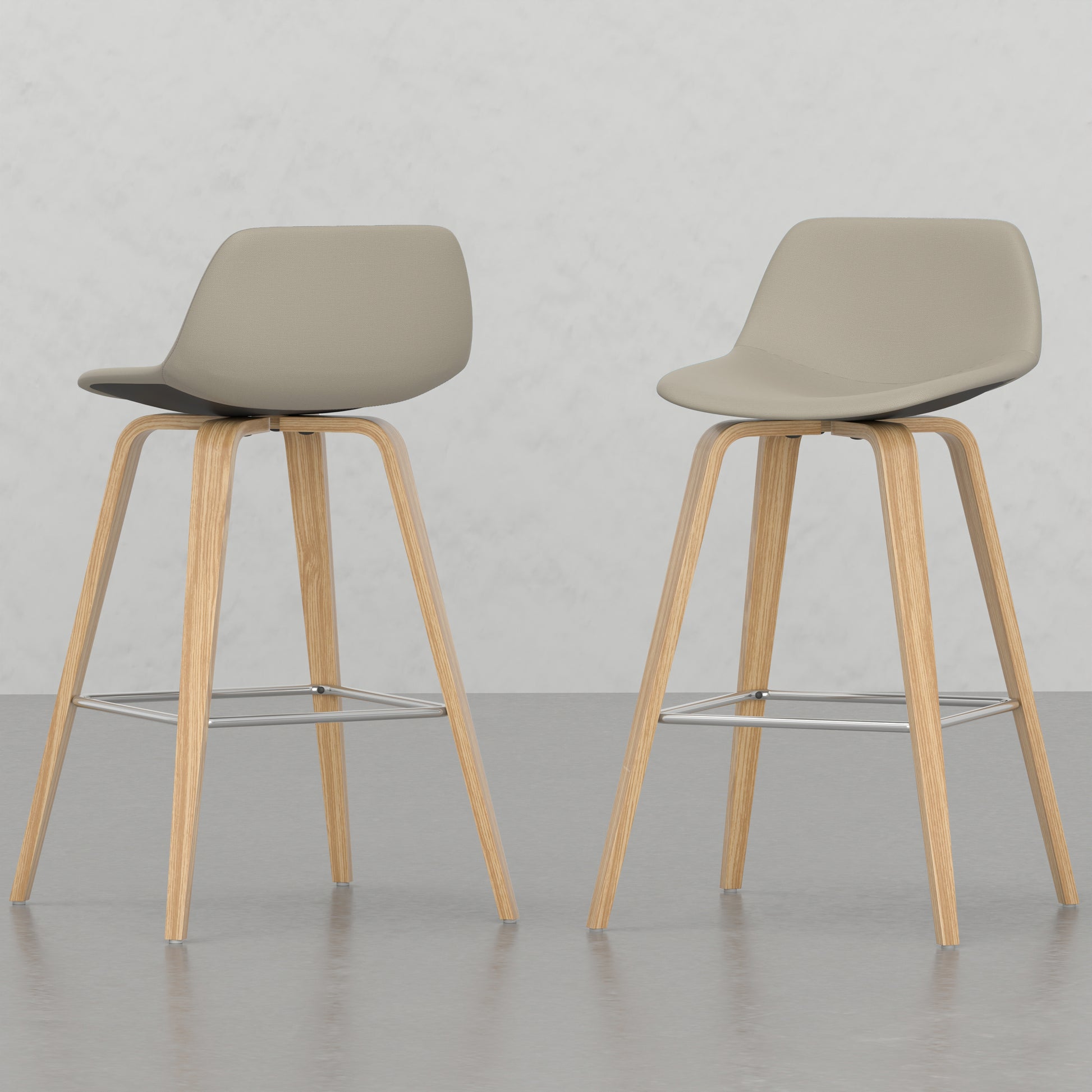 Beige upholstered modern bar stool with light wood legs and chrome footrest
