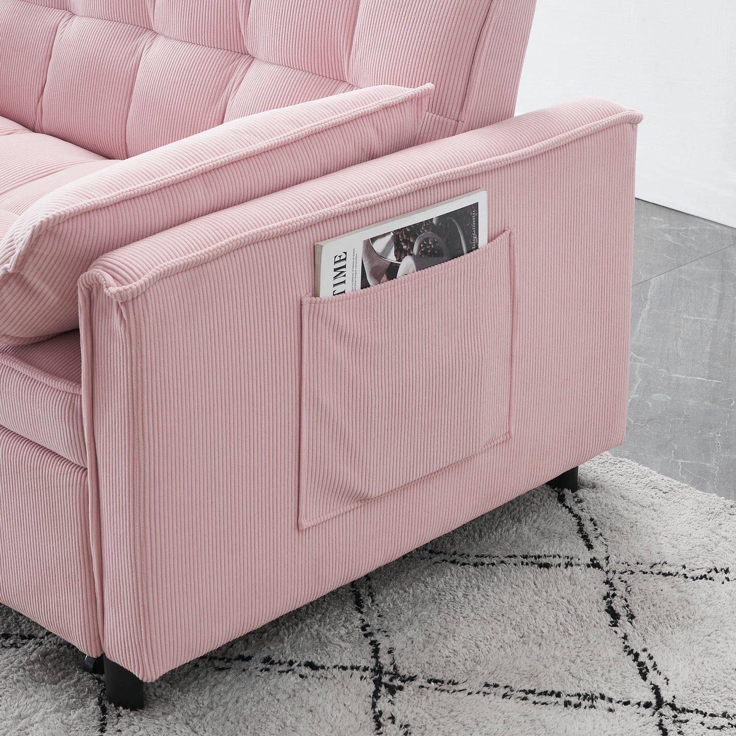 Pink corduroy sofa with tufted back and convenient side pocket