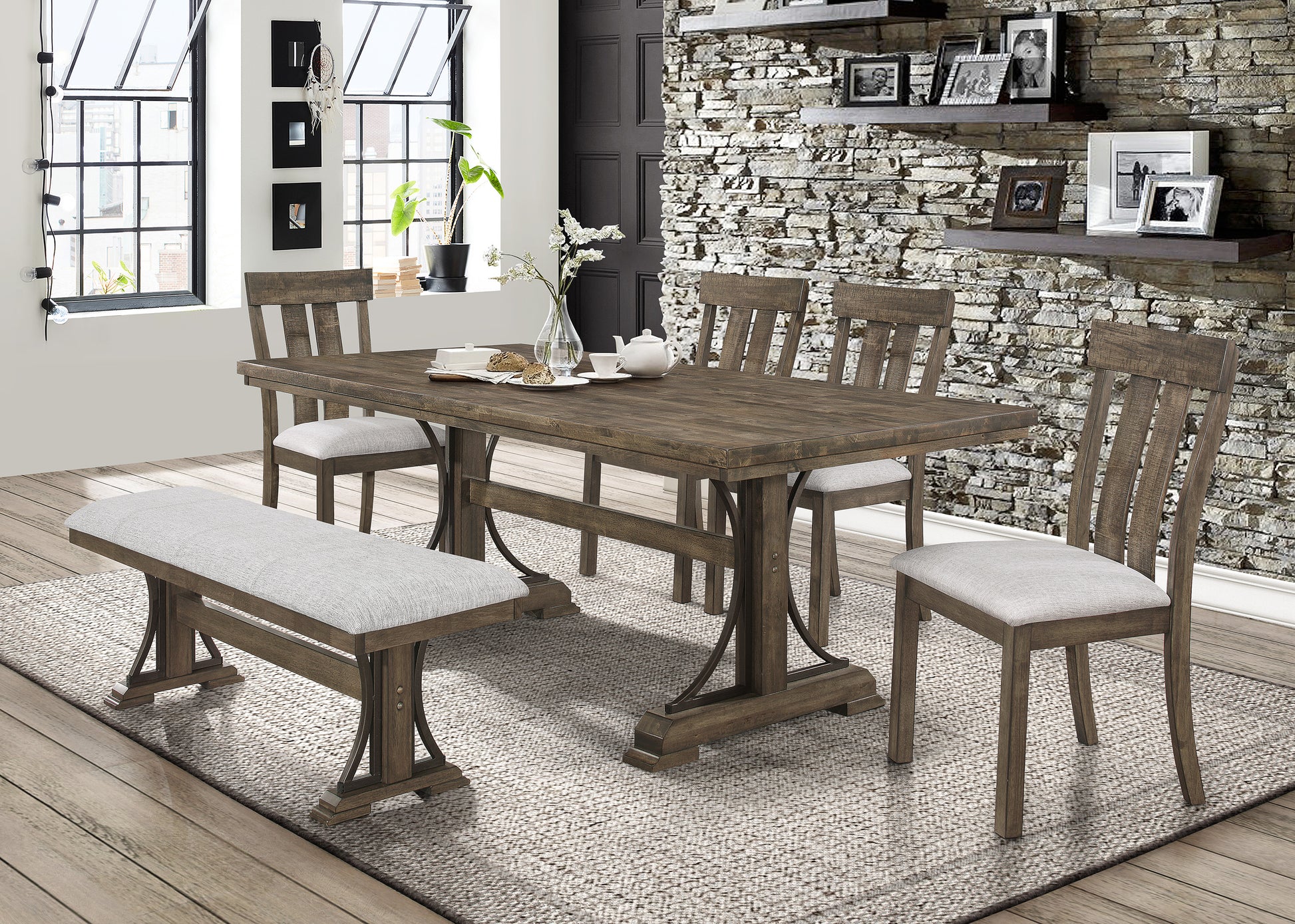 Rustic wooden dining table set with upholstered bench and chairs