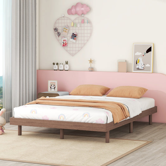 Wooden platform bed frame with rainbow cloud sheets and orange throw