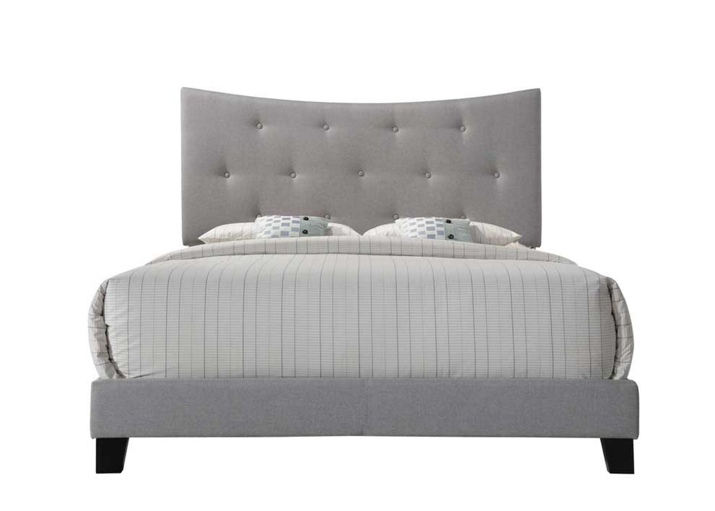 Gray upholstered modern king bed with tufted curved headboard and subtle striped bedding
