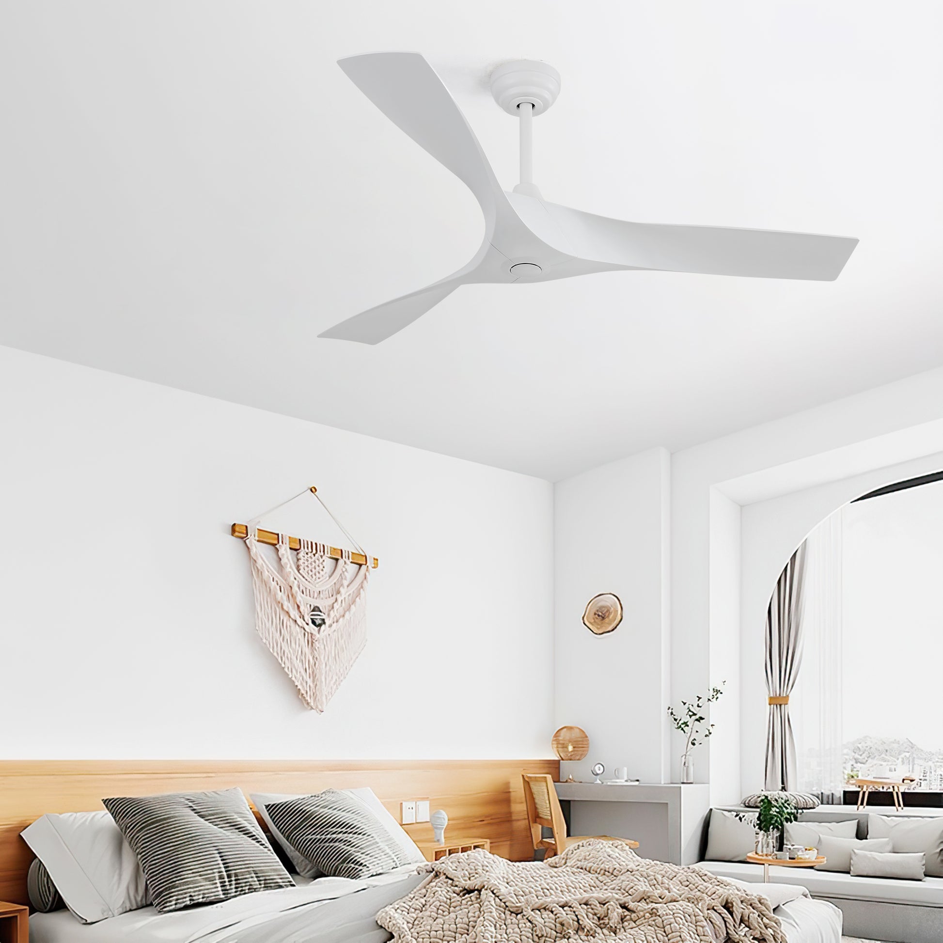 Modern white threeblade ceiling fan with a minimalist design perfect for bedrooms