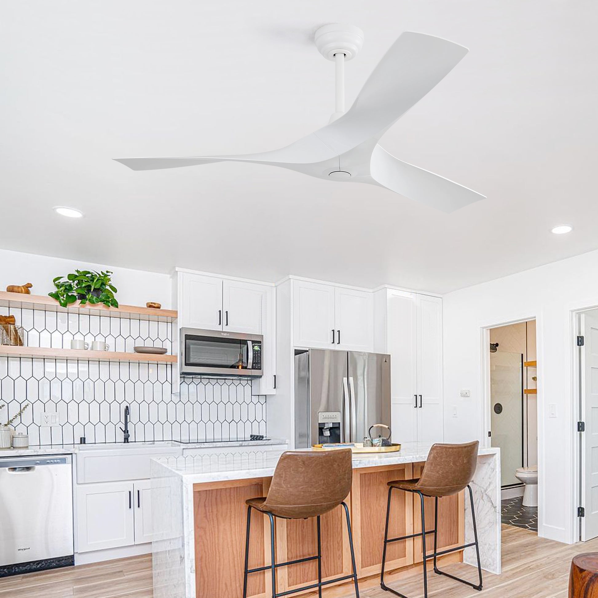 Modern white ceiling fan with three curved blades providing stylish airflow for living spaces