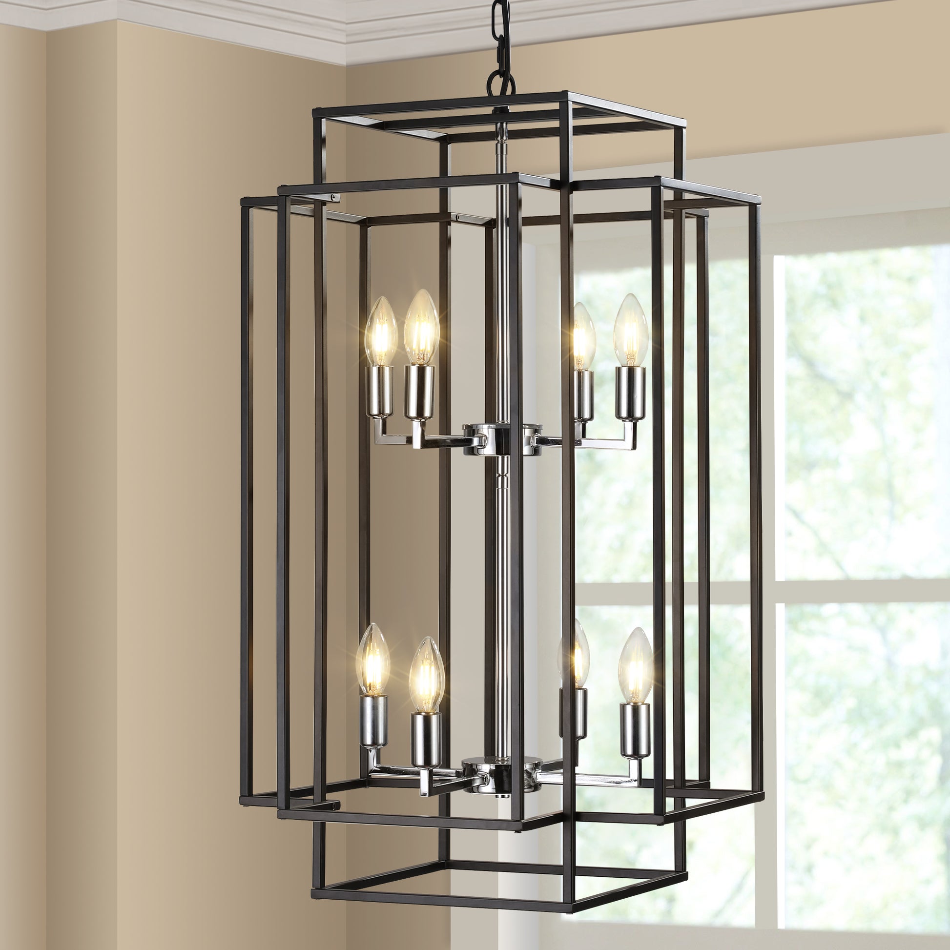 Black metal geometric chandelier with clear Edison bulbs illuminating a dining room
