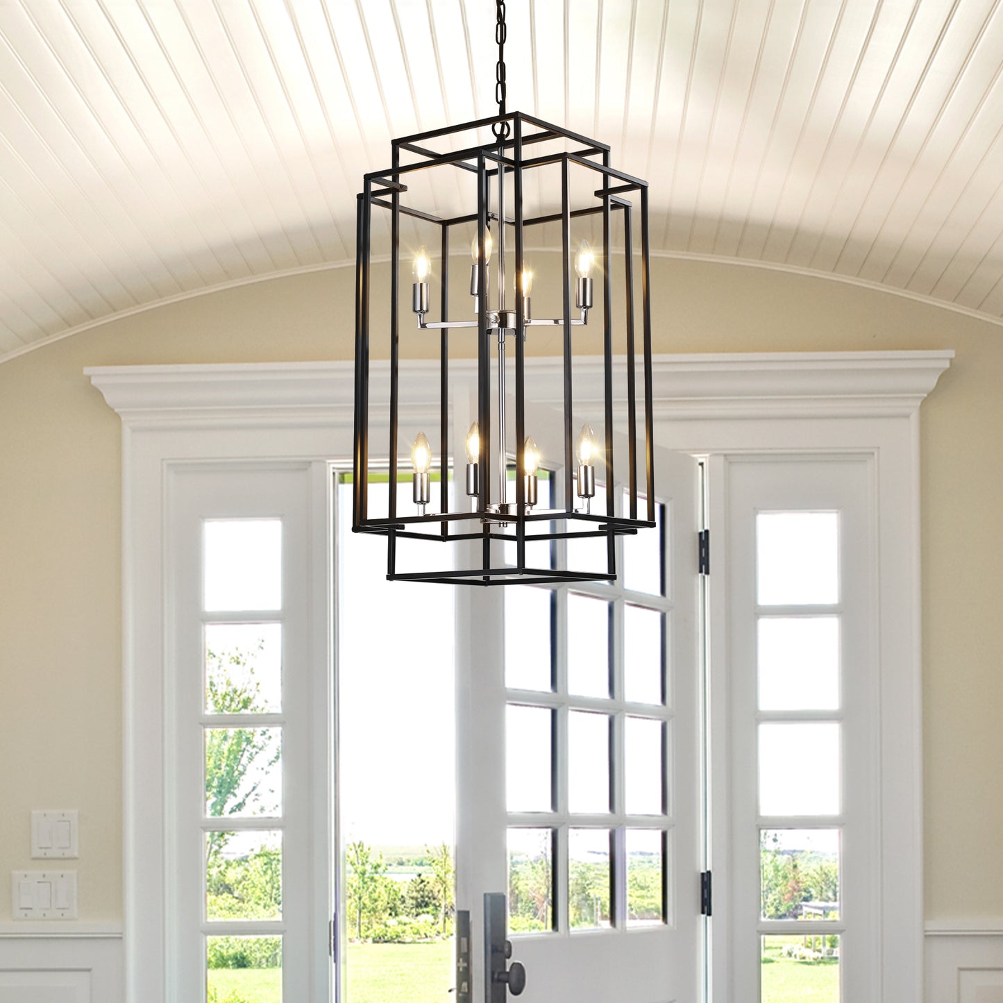 Modern black geometric cage chandelier with clear bulbs and silver accents