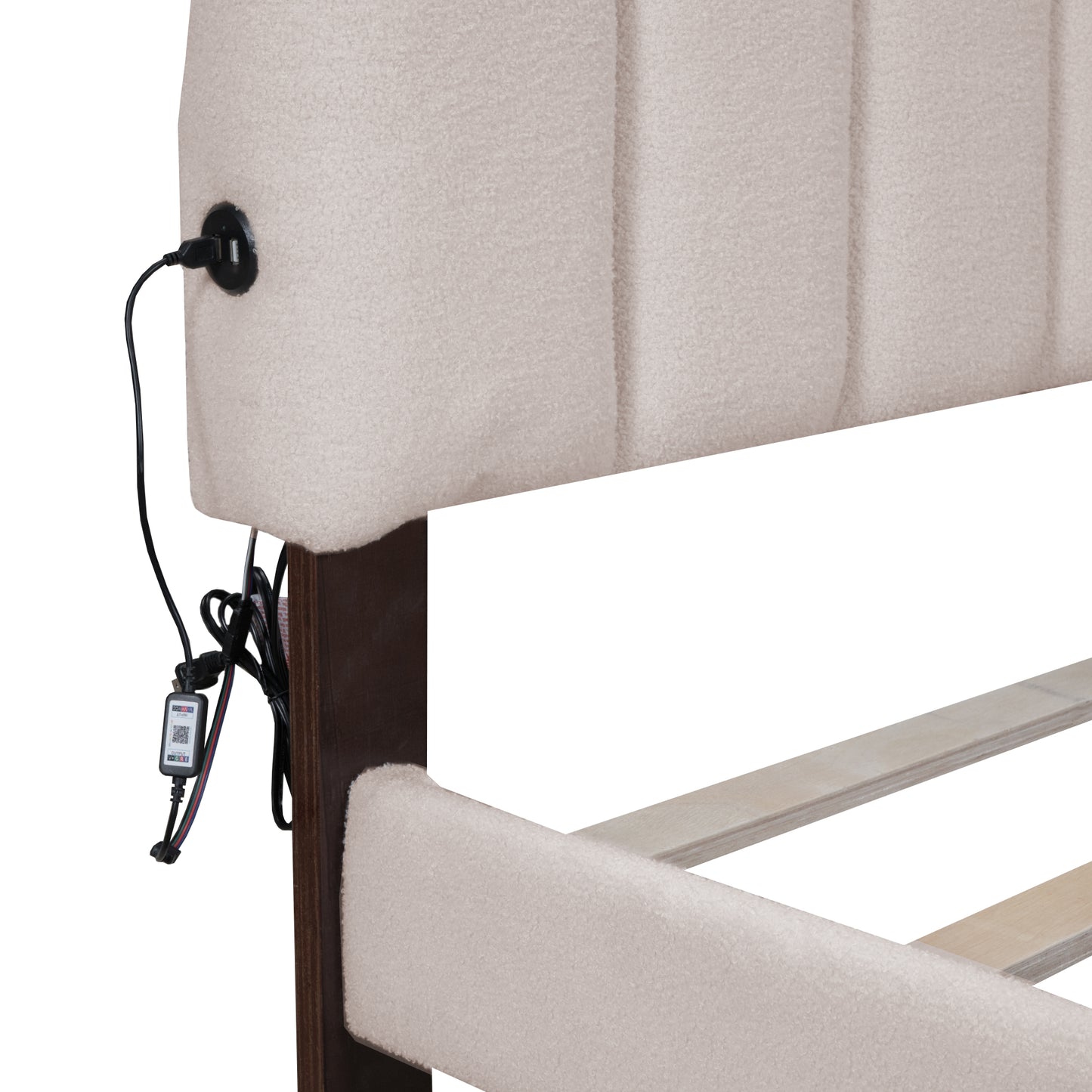 Beige upholstered headboard with integrated USB charging port