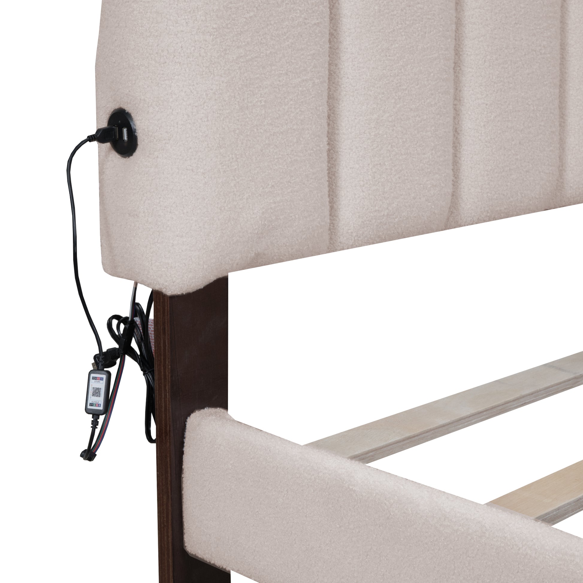 Beige upholstered headboard with integrated USB charging port