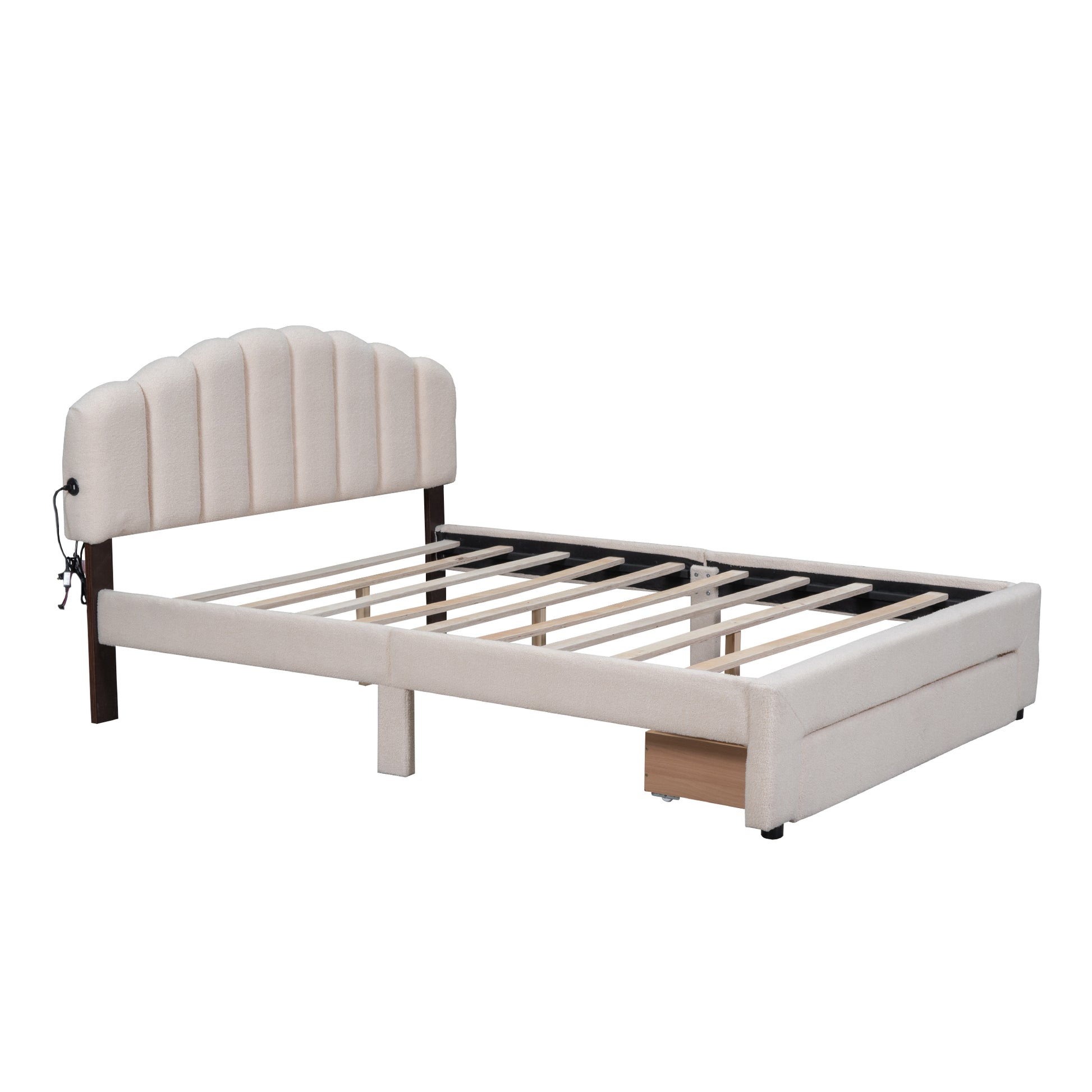 Cream upholstered platform bed frame with scalloped headboard and wood slats