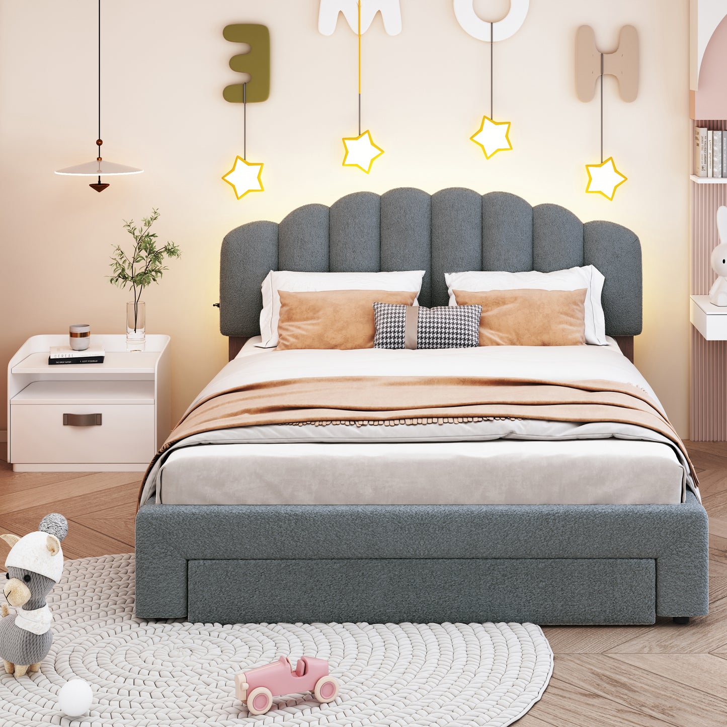 Gray upholstered twin bed with scalloped headboard and builtin storage