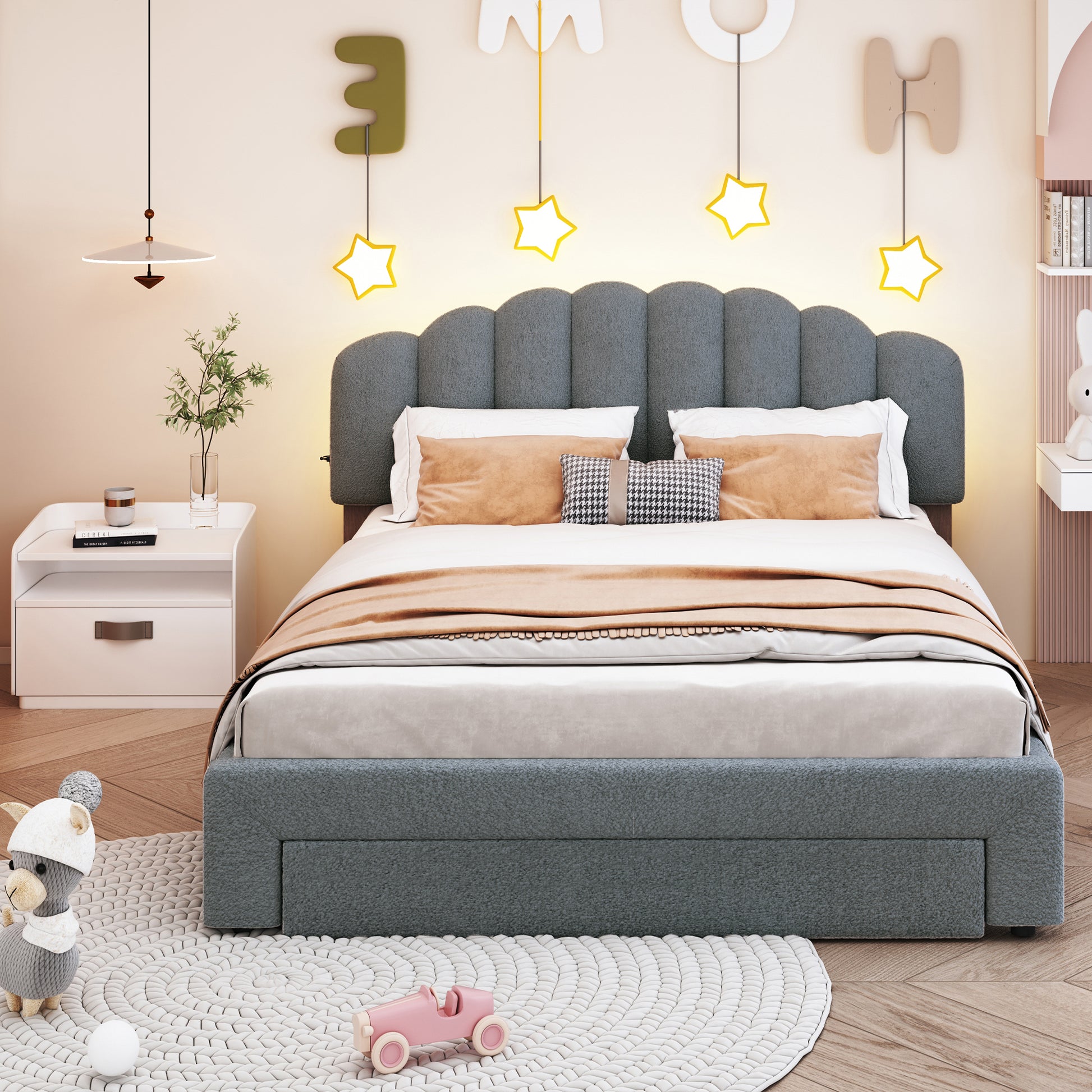 Gray upholstered twin bed with scalloped headboard and builtin storage
