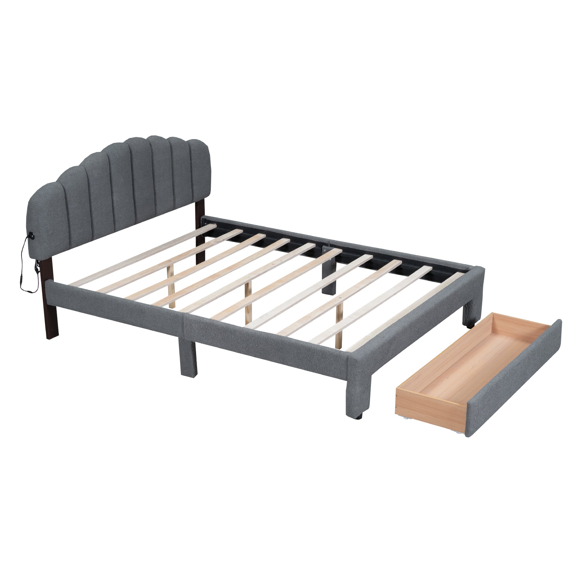 Gray upholstered bed frame with scalloped headboard and pullout drawer