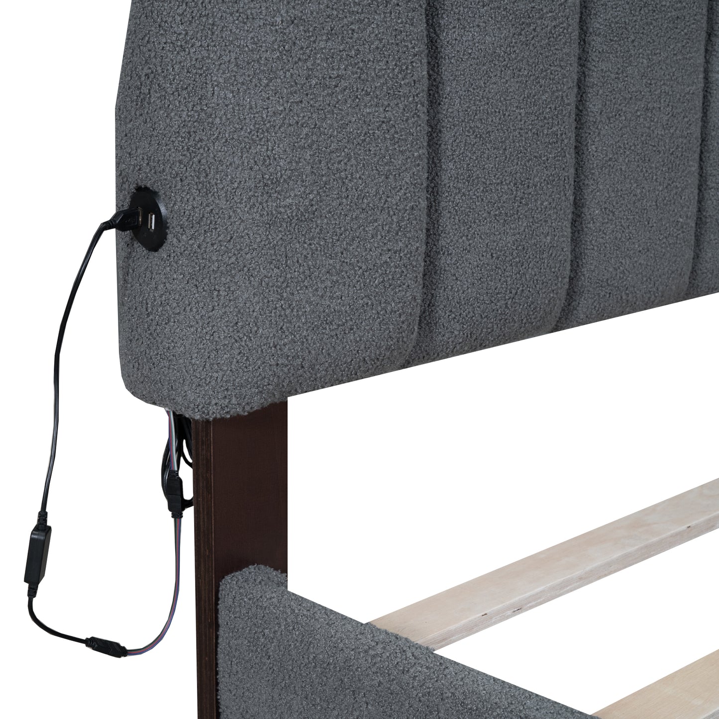 Gray upholstered headboard with integrated USB charging ports