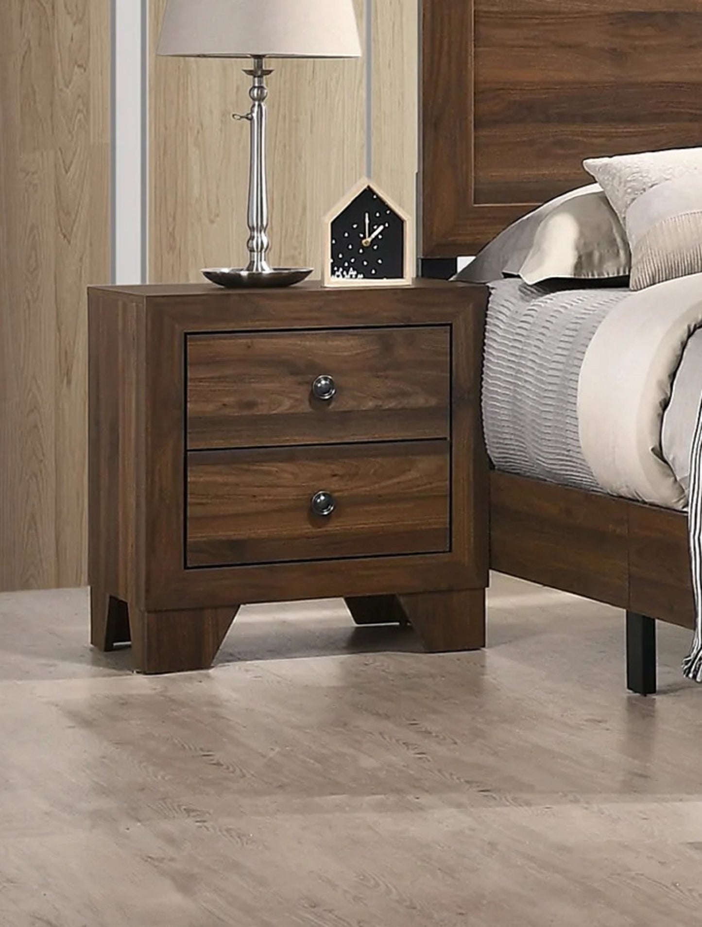 Dark wood nightstand with two drawers and silver knobs complementing a bedroom set