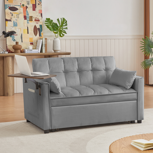 Gray velvet sofa bed with tufted cushions and attached tray table perfect for small spaces
