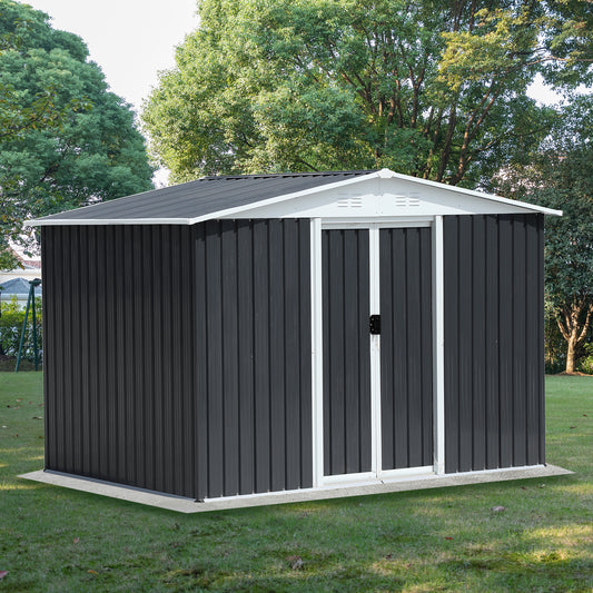 Dark gray metal garden shed with white trim and double doors providing outdoor storage