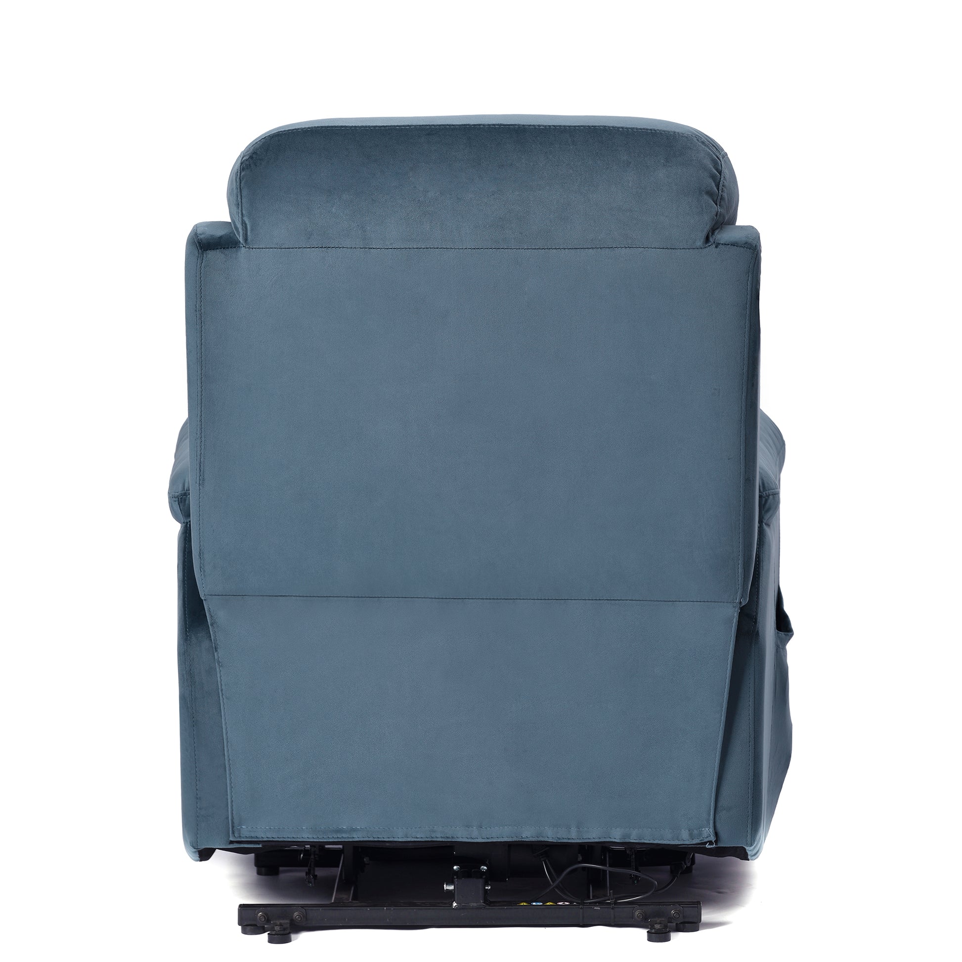Back view of a plush teal velvet recliner chair with visible motor mechanism