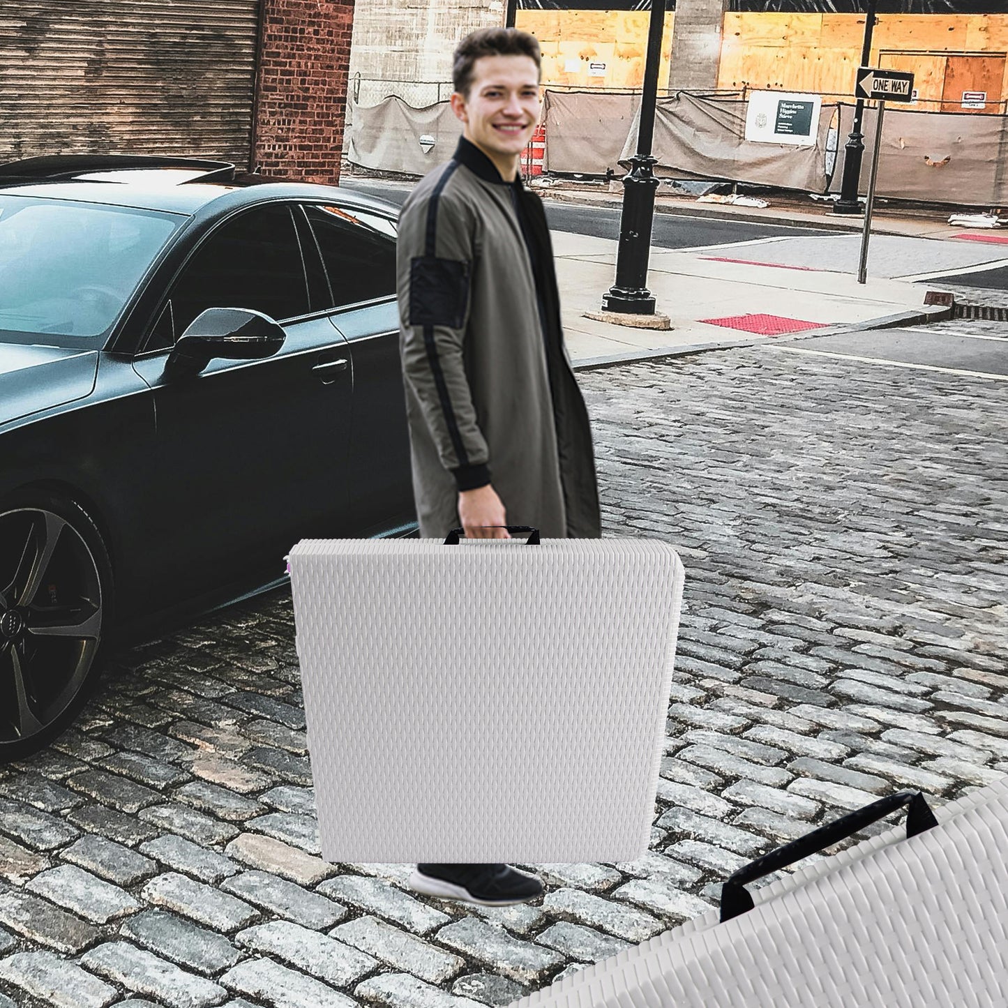 White textured hardside suitcase with black handle ideal for travel
