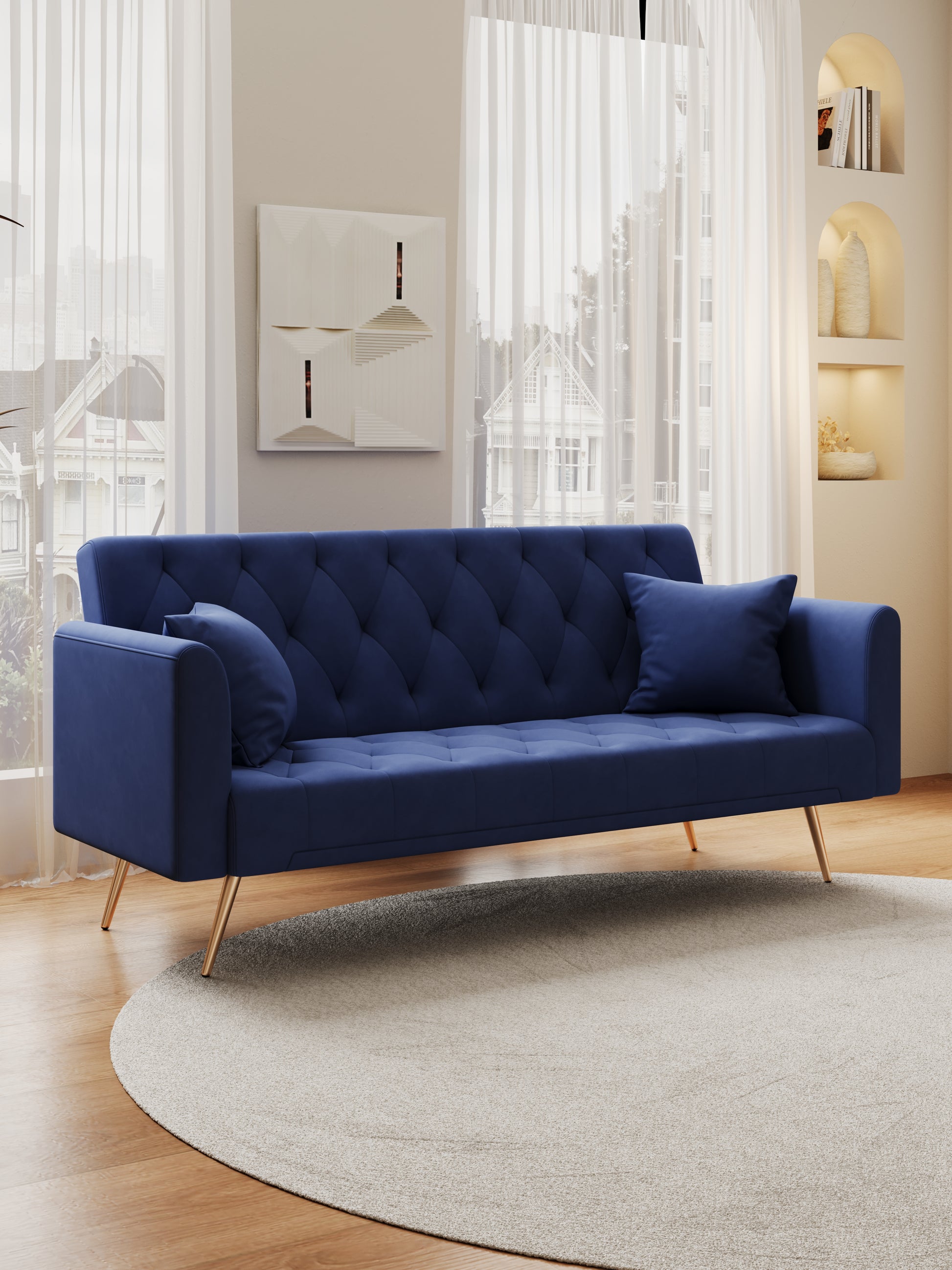 Deep blue velvet tufted sofa with gold legs and included cushions