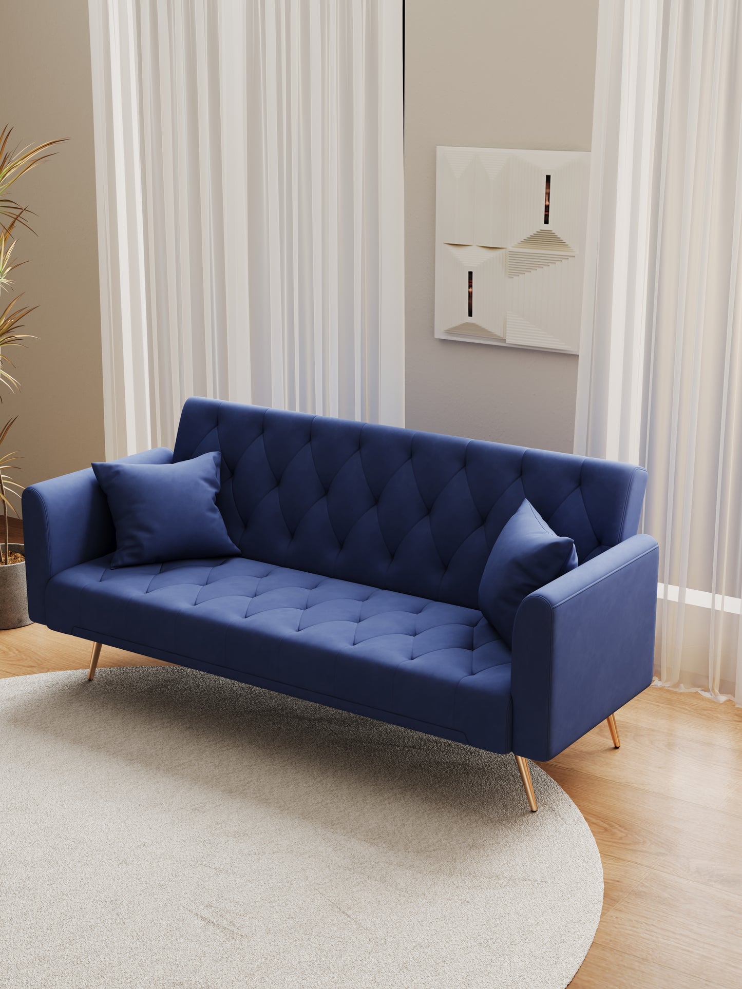 Navy blue velvet sofa with tufted back and brass legs ideal for living rooms