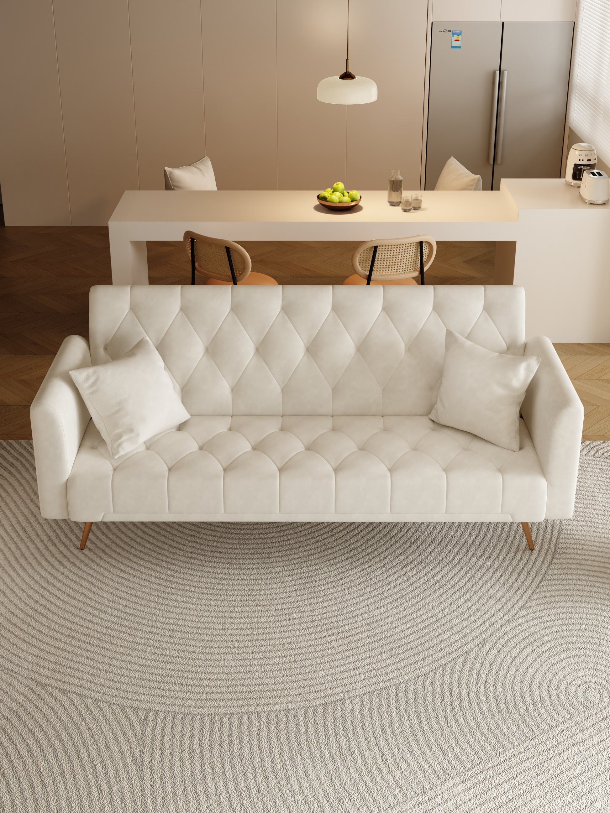 Tufted cream velvet sofa with diamond stitching and plush pillows for modern living rooms