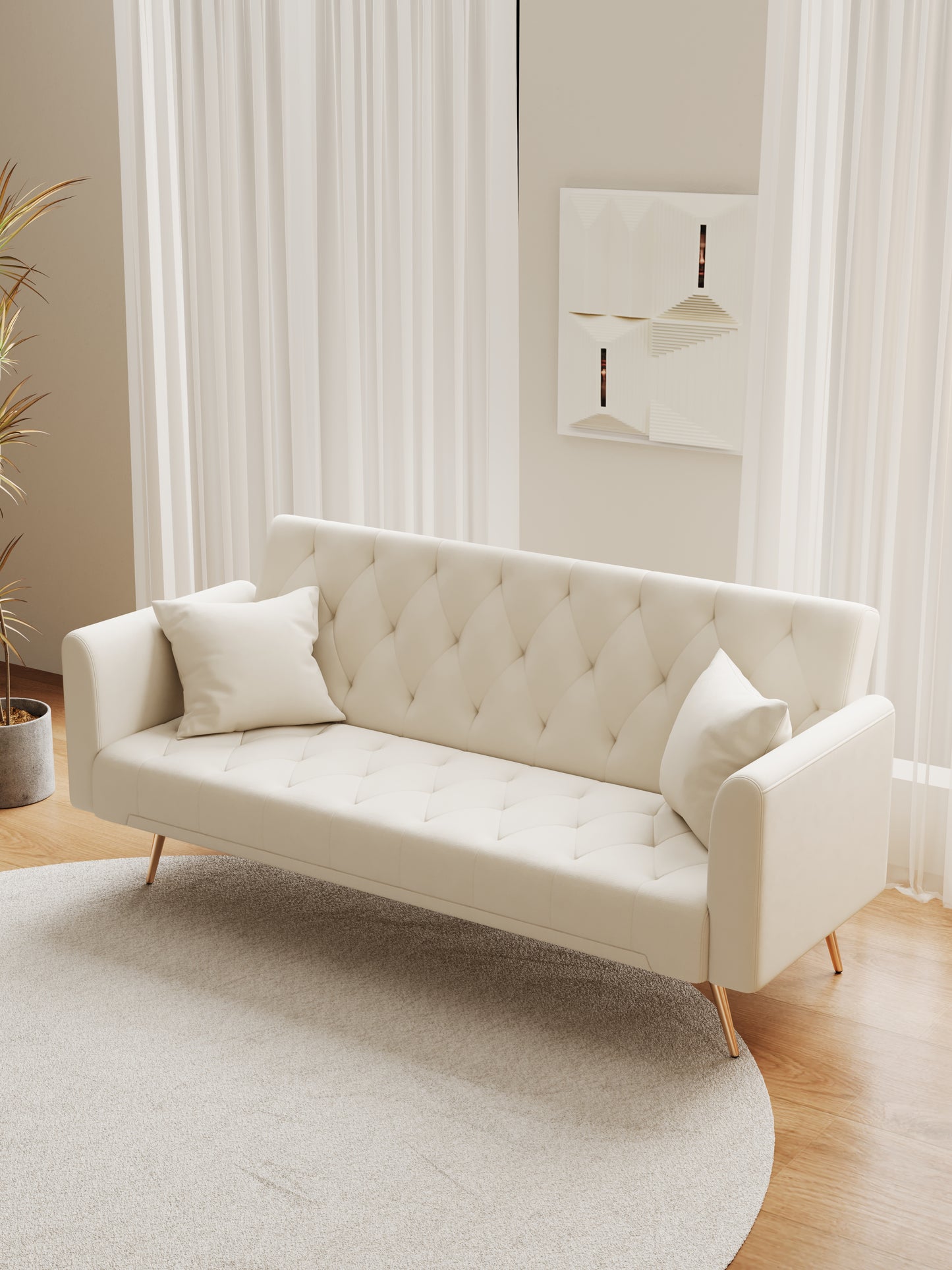 Tufted cream fabric sofa with gold legs perfect for a modern living room