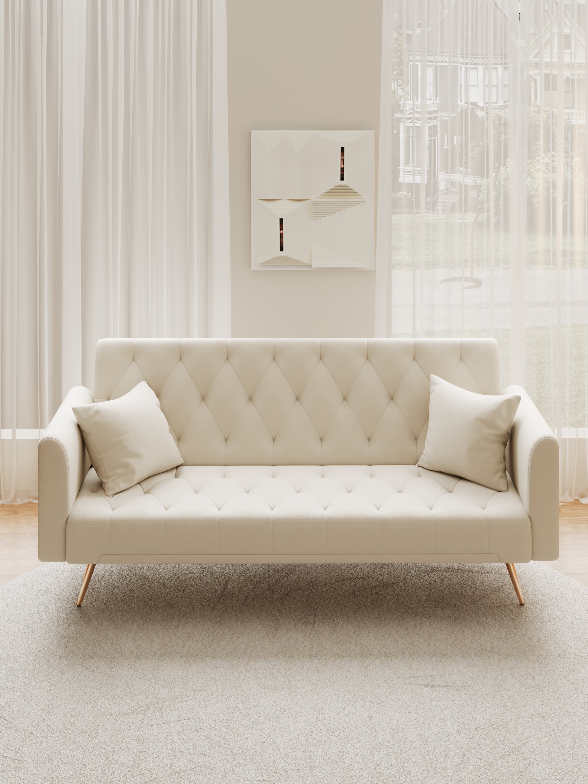 Cream tufted sofa with diamond stitching and gold legs