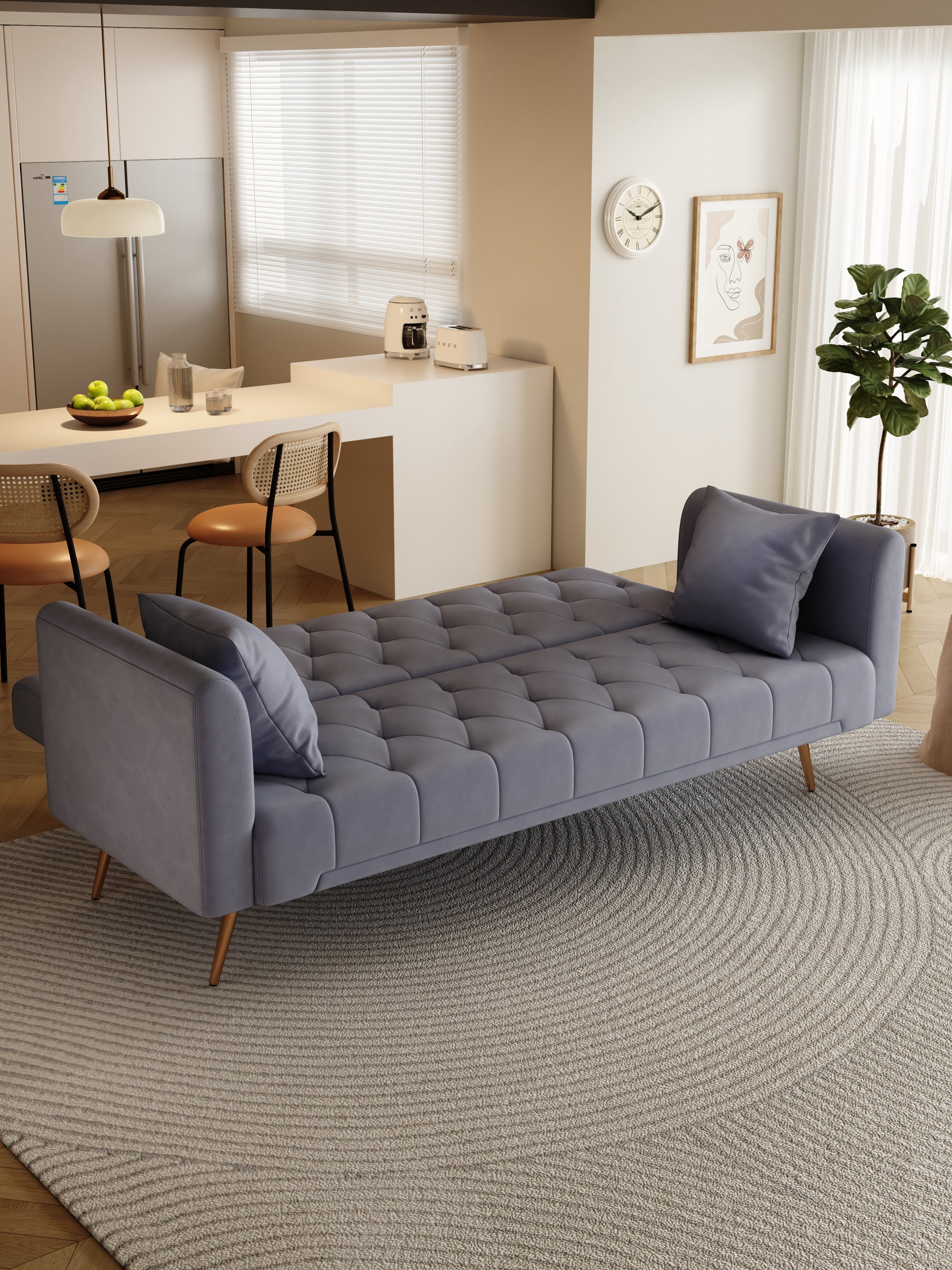 Tufted velvet sofa in dusty blue with wooden legs perfect for modern living rooms
