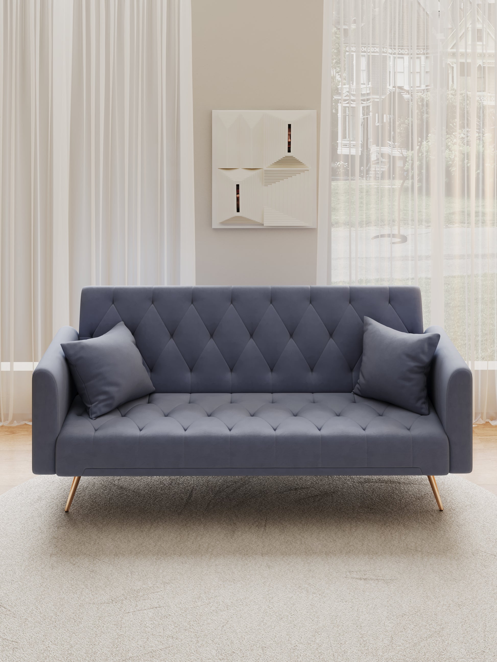 Tufted gray velvet sofa with diamond stitching and two matching throw pillows
