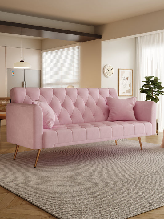 Tufted pink velvet sofa with diamond pattern and gold legs perfect for a modern living room