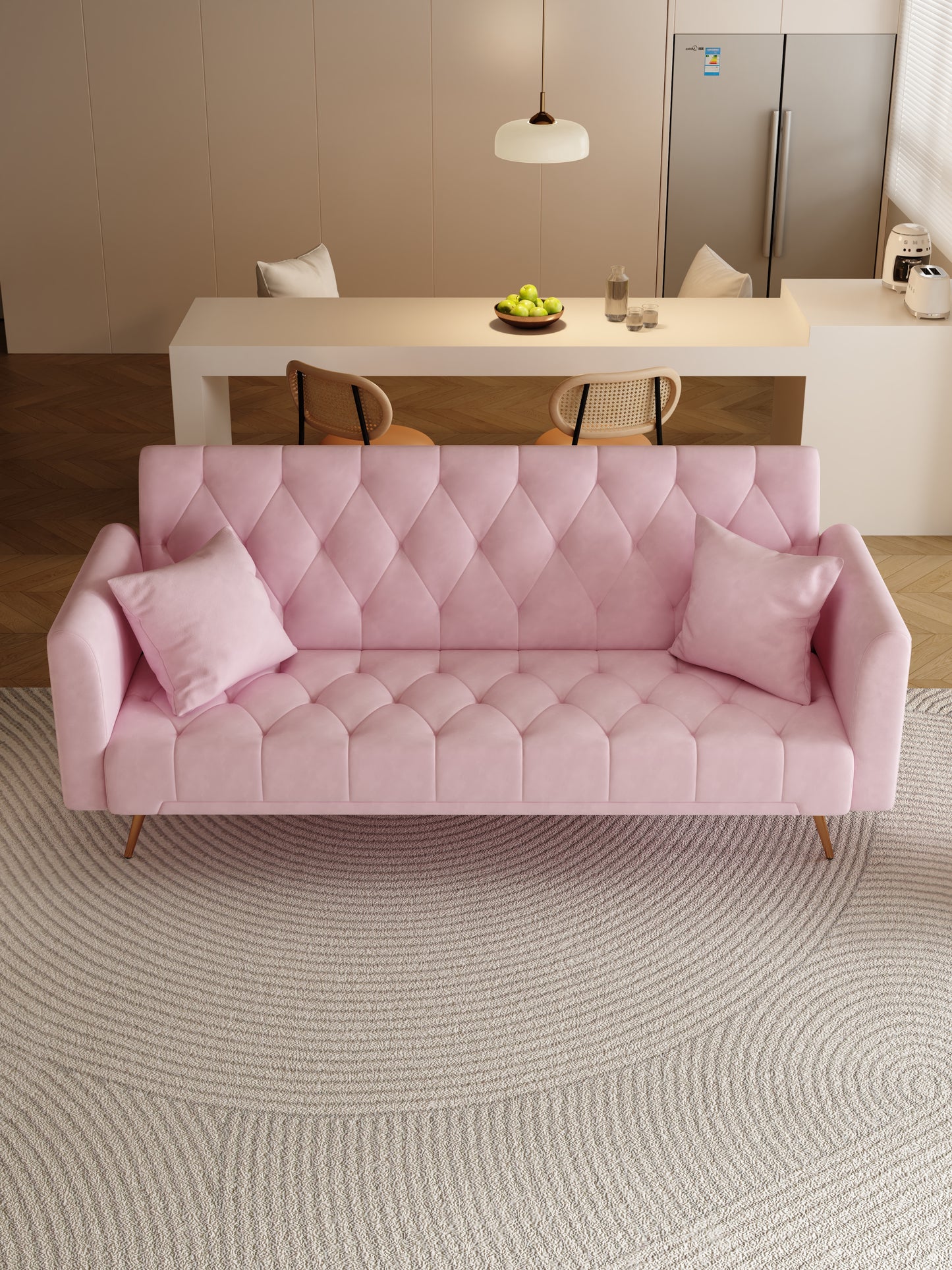 Plush pink velvet sofa with diamond tufting and two matching pillows perfect for a modern living room
