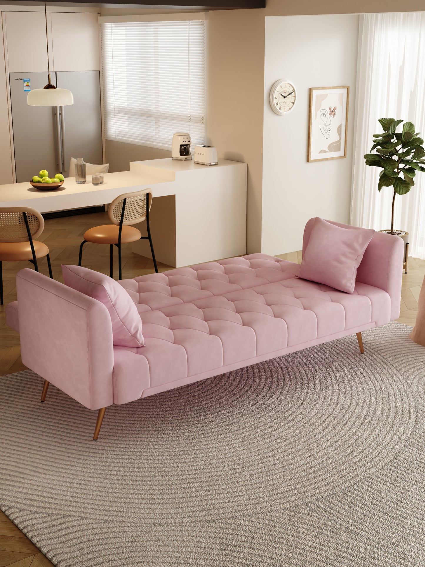 Plush pink velvet sofa bed with tufted detailing and gold legs