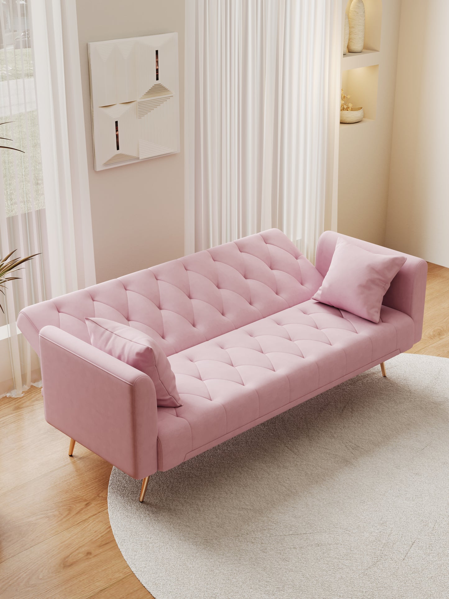 Pink velvet tufted sofa with gold legs perfect for small living rooms