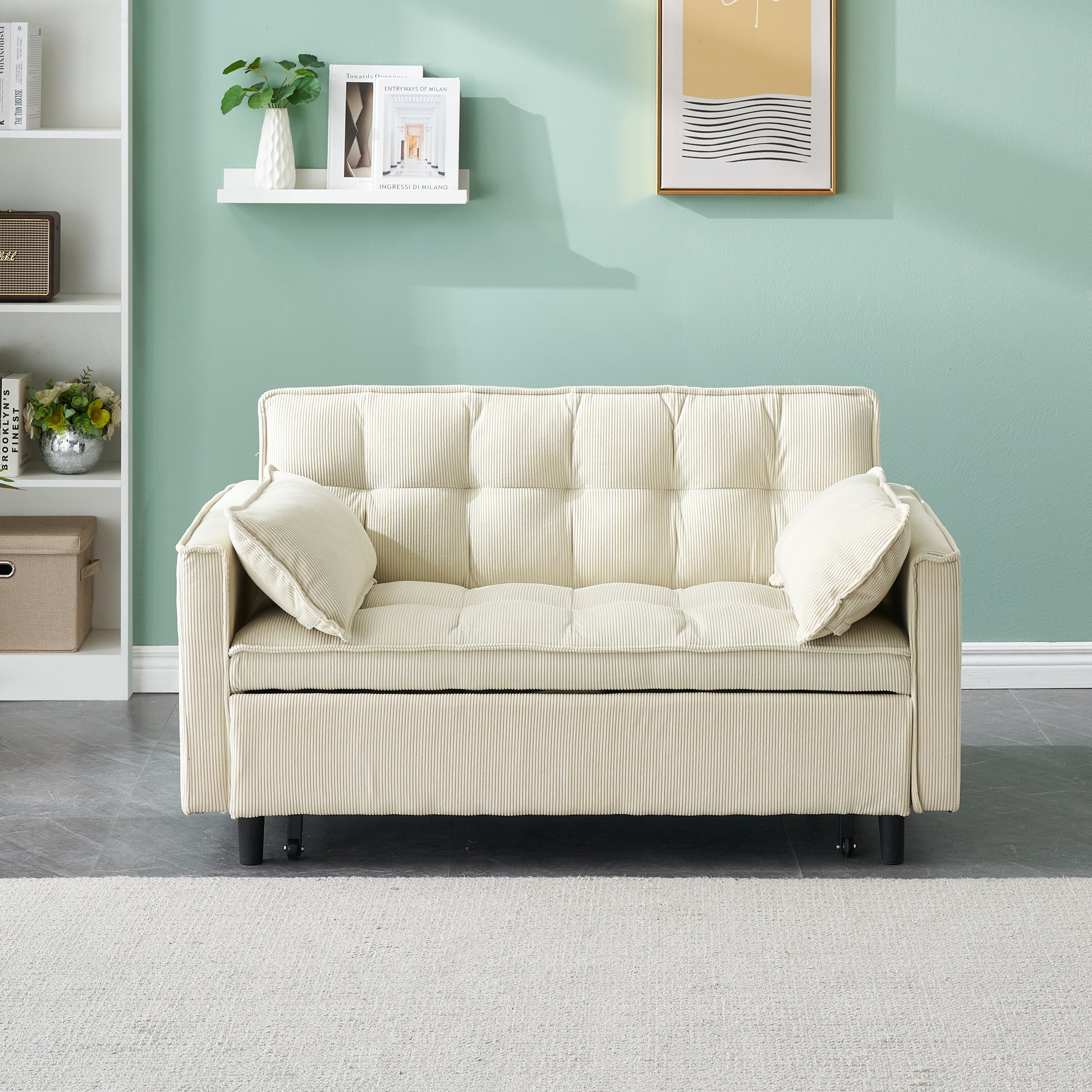 Cream corduroy sofa with tufted cushions and two throw pillows