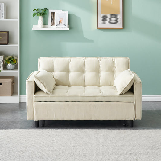 Cream corduroy sofa with tufted cushions and two throw pillows