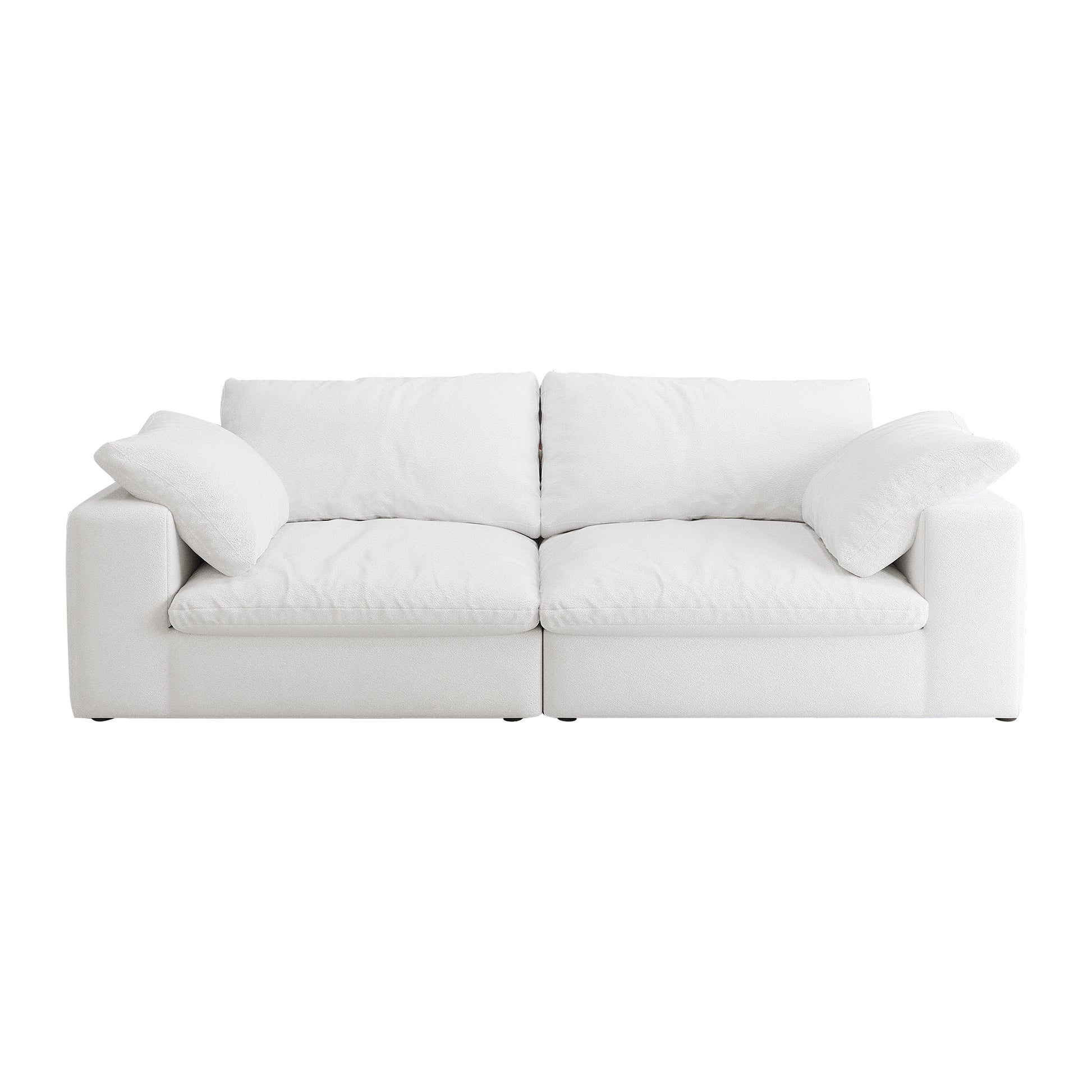Plush white sectional sofa with deep seats and comfortable throw pillows for modern living rooms