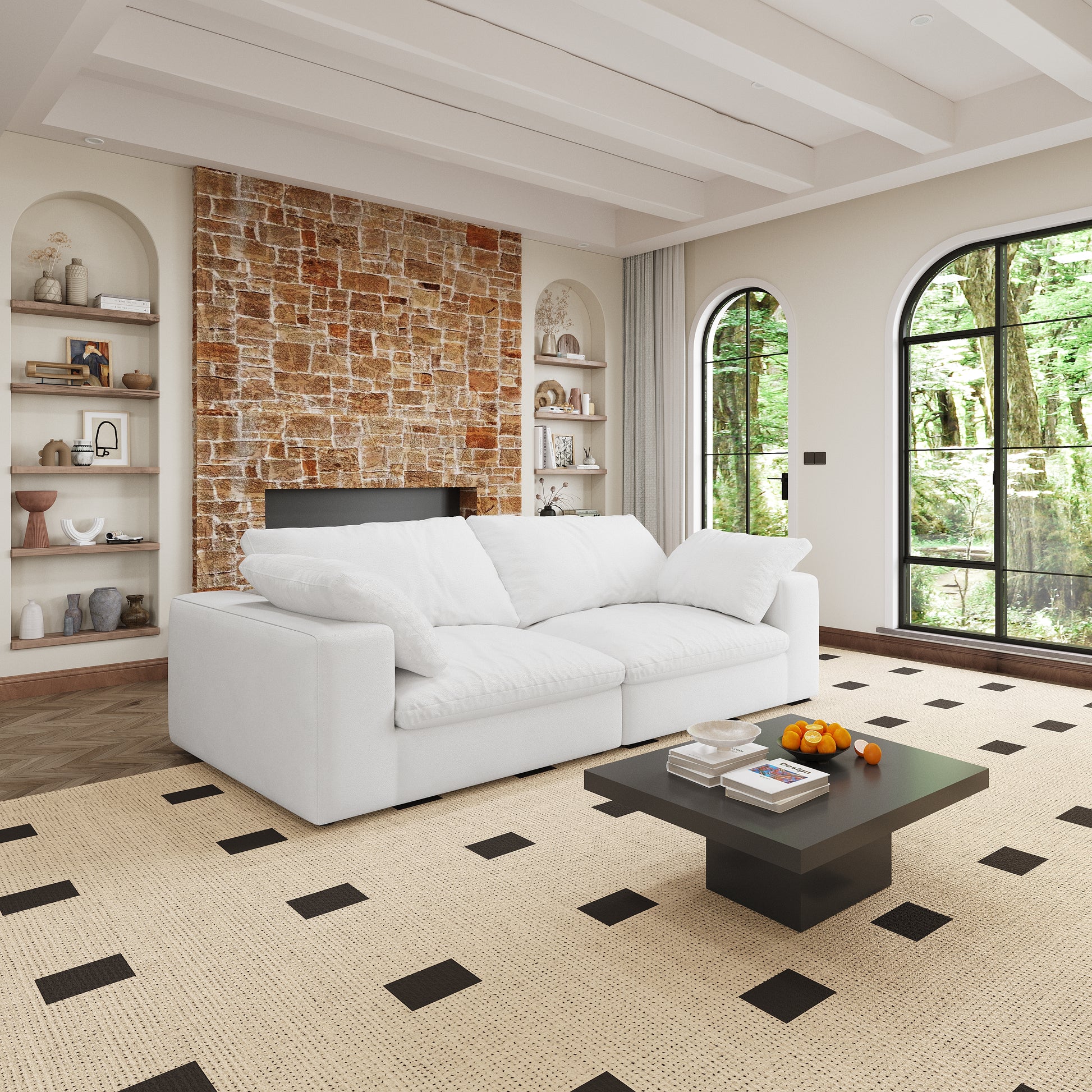 Plush white modular sectional sofa in a modern living room with stone fireplace