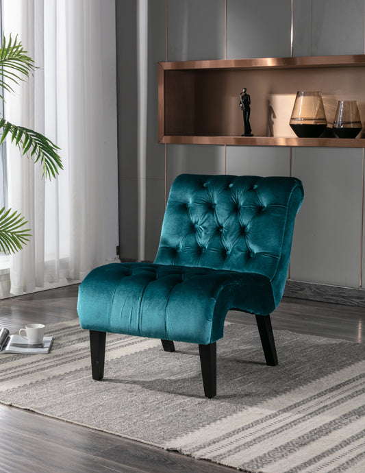 Teal velvet accent chair with diamond tufting and dark wooden legs perfect for living rooms