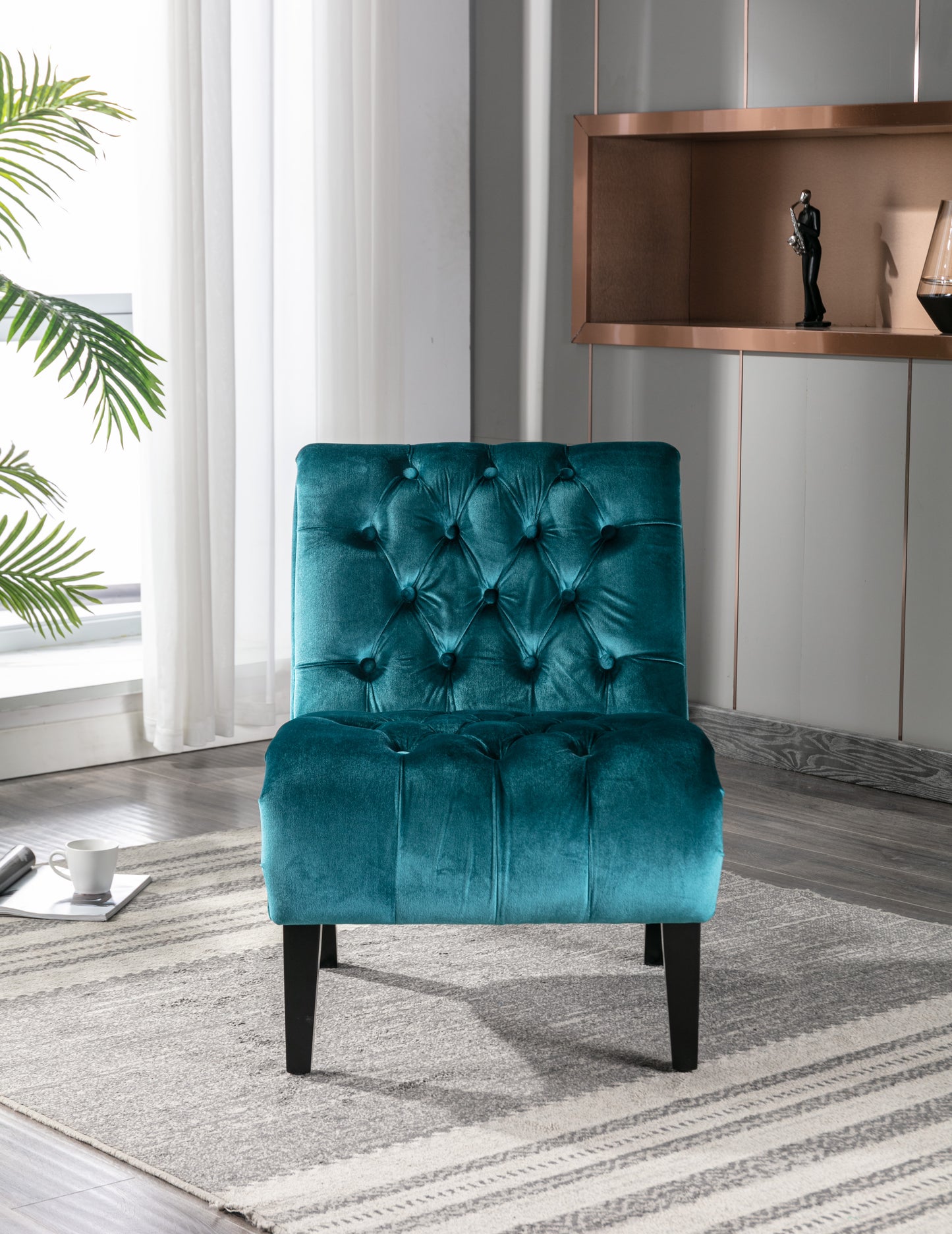 Tufted teal velvet accent chair with diamondstitched back and seat