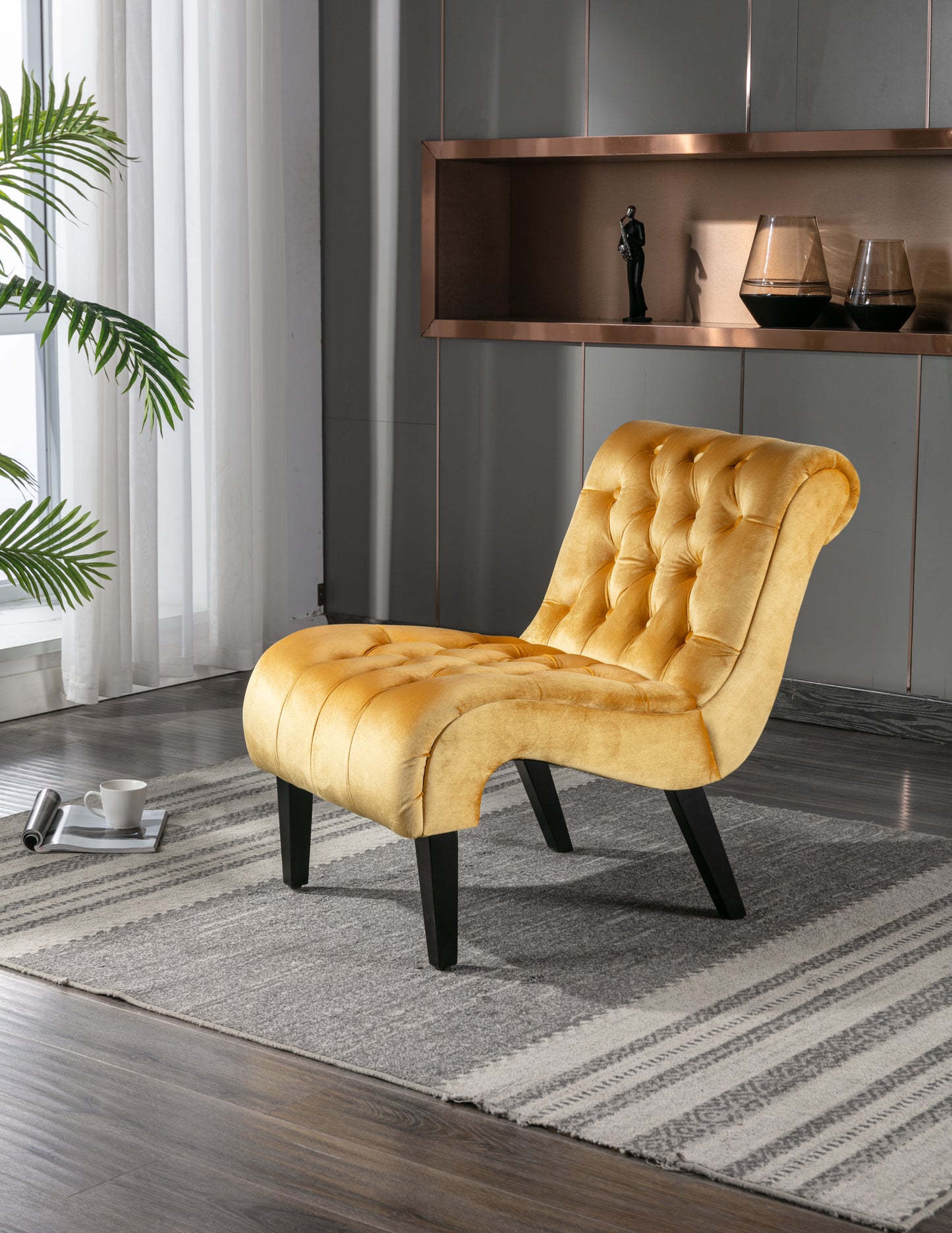 Luxurious yellow velvet accent chair with tufted backrest and modern design