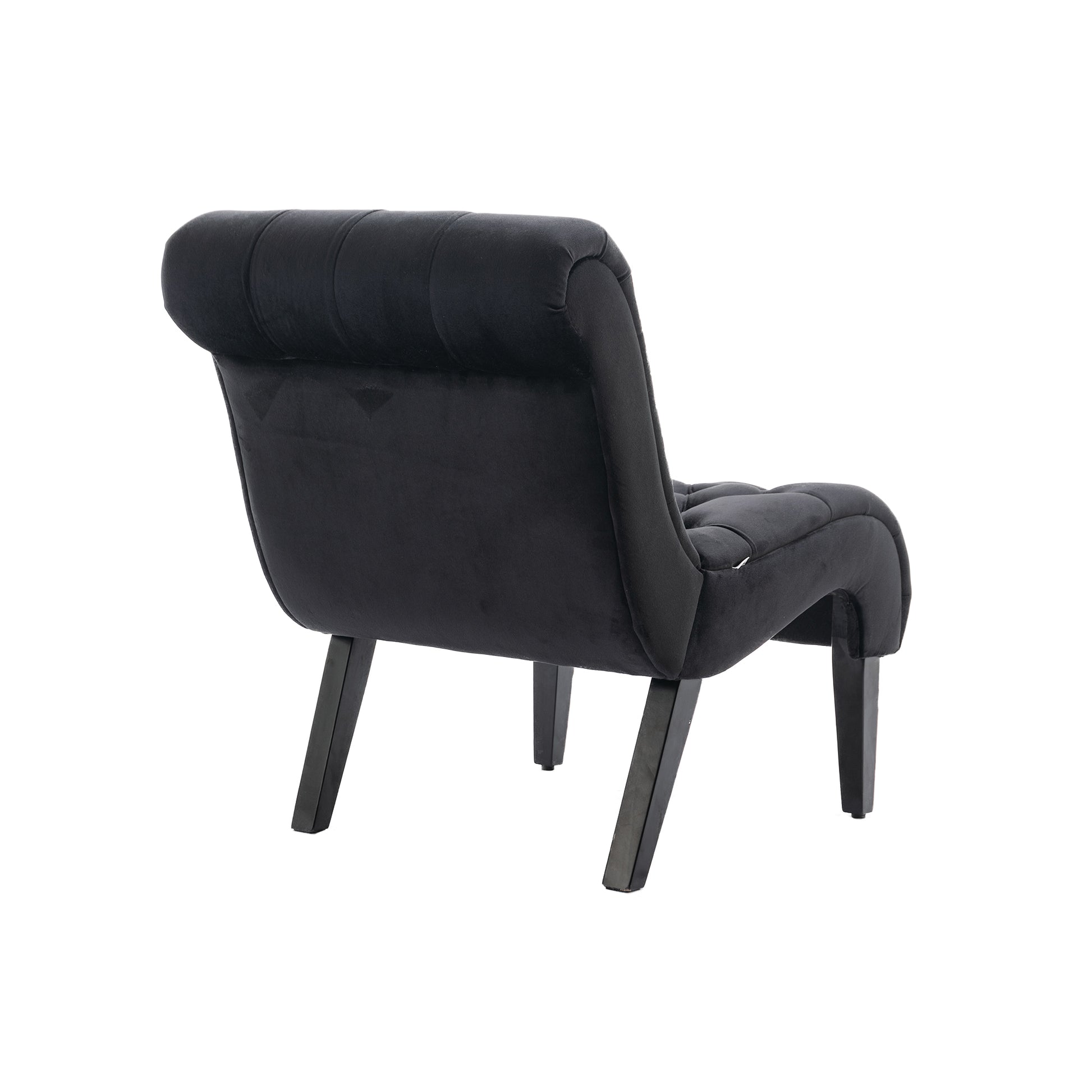 Black velvet accent chair with tufted back and sleek wooden legs