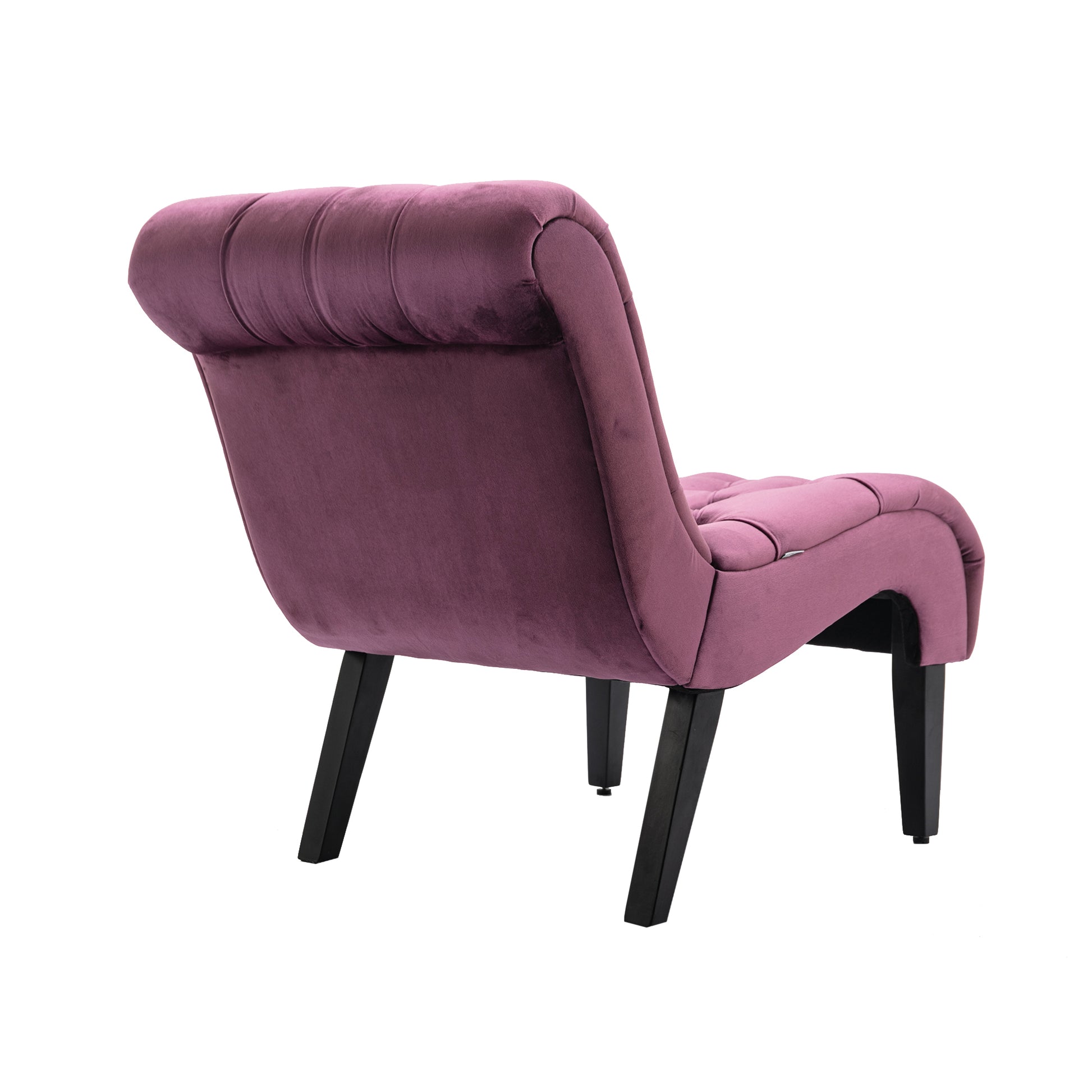 Plush velvet accent chair in dusty rose with button tufting and black tapered legs