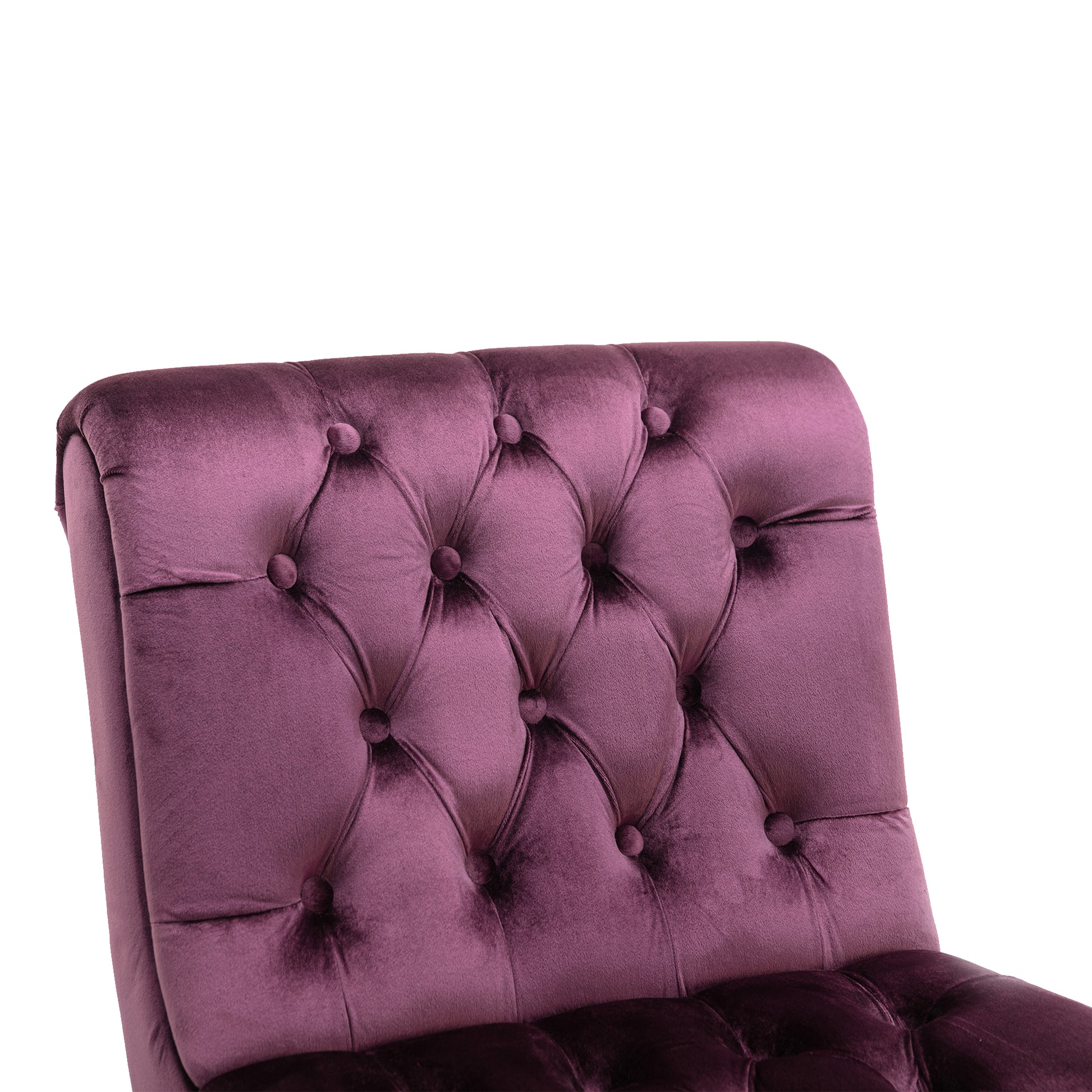 Deep plum velvet upholstered armchair with diamond tufting detail
