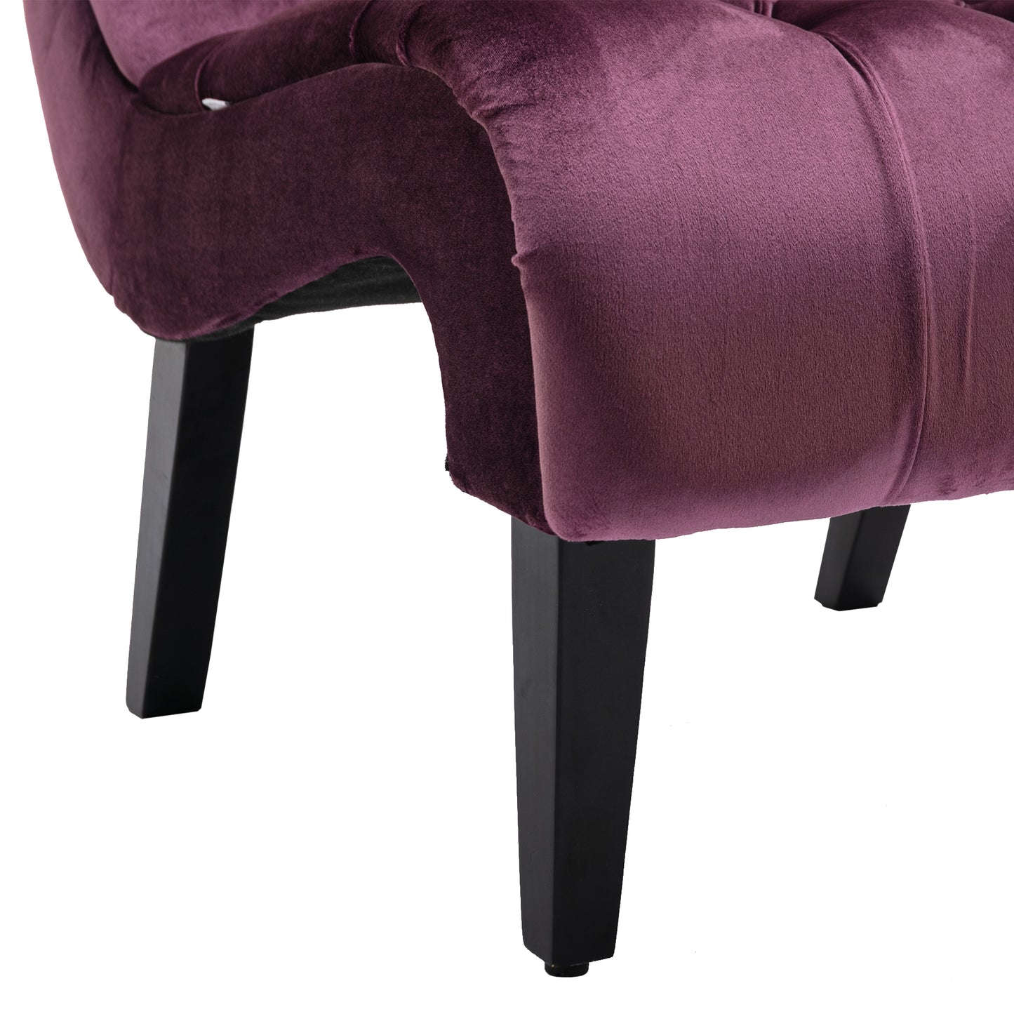 Plush aubergine velvet armchair accent with tufted detailing and dark wood legs